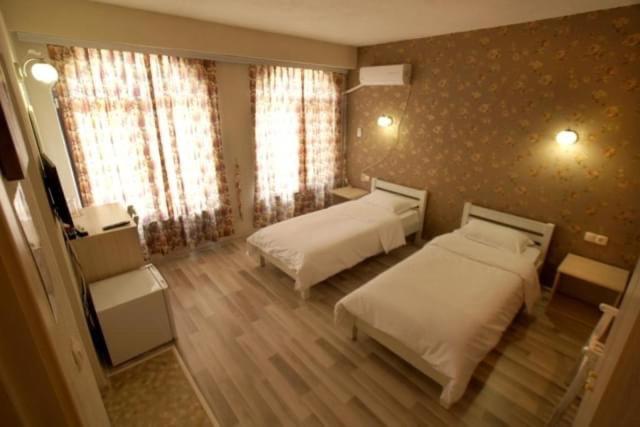 Twin Room - Photo 1