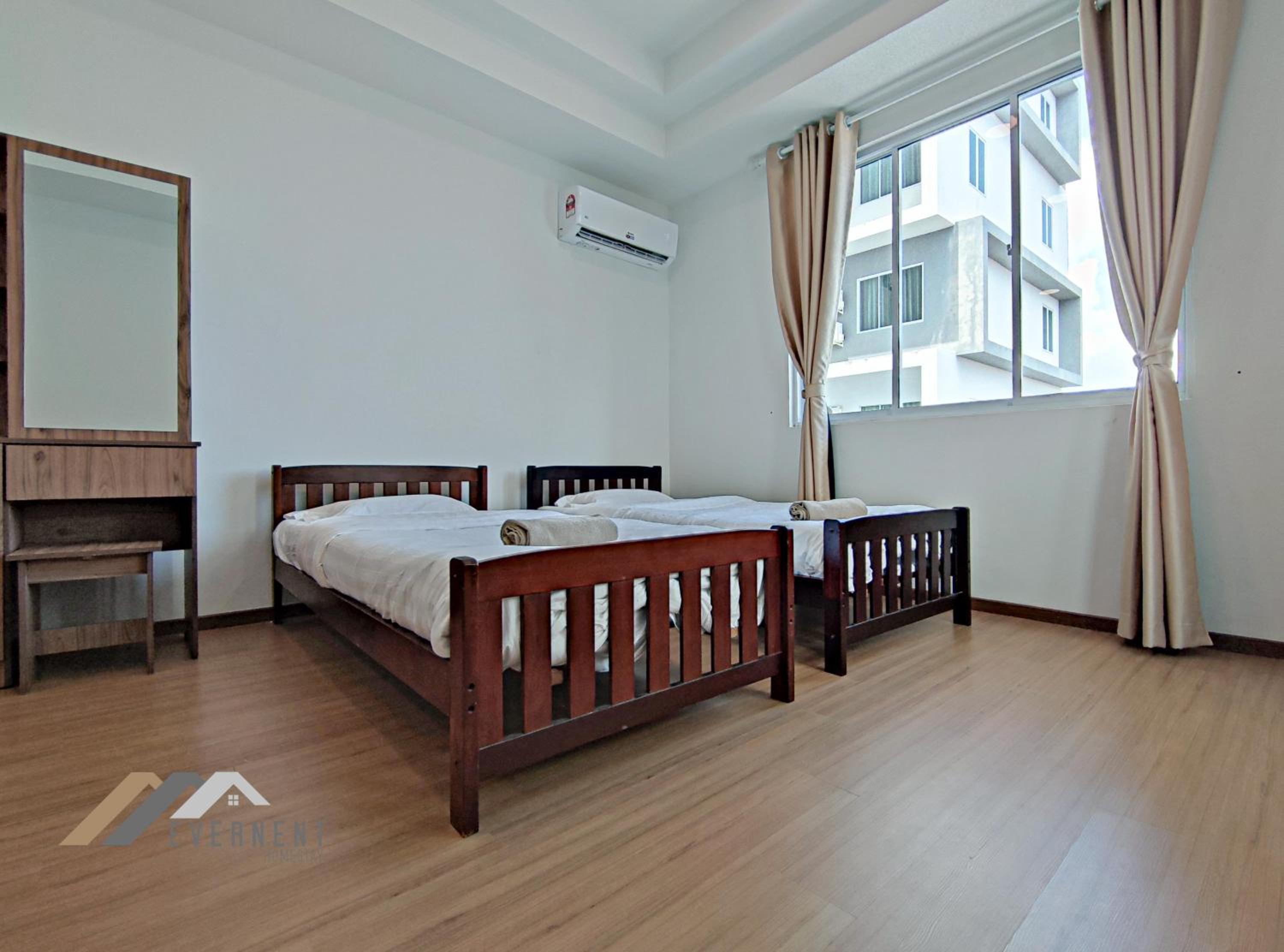 Three-Bedroom Apartment photo 1
