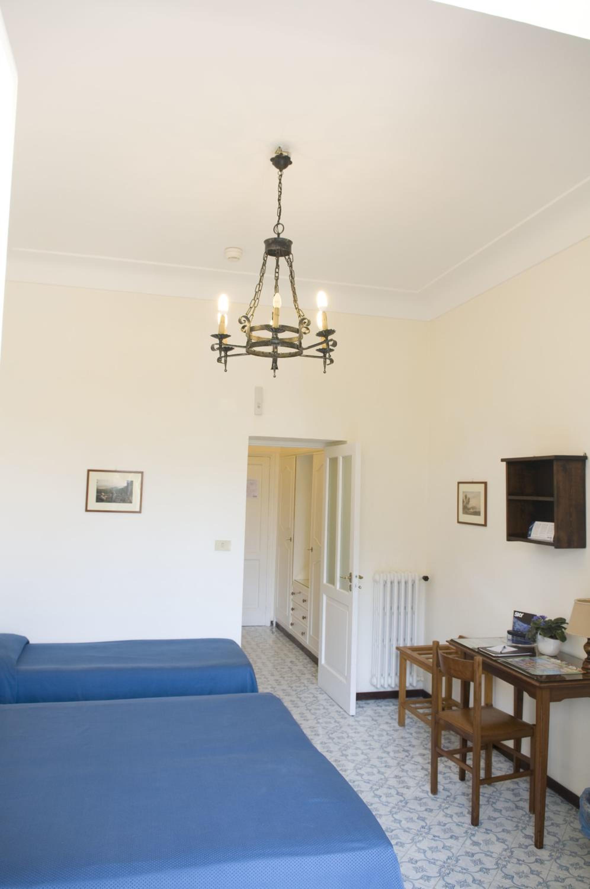 Superior Triple Room with Balcony and Garden View photo 3