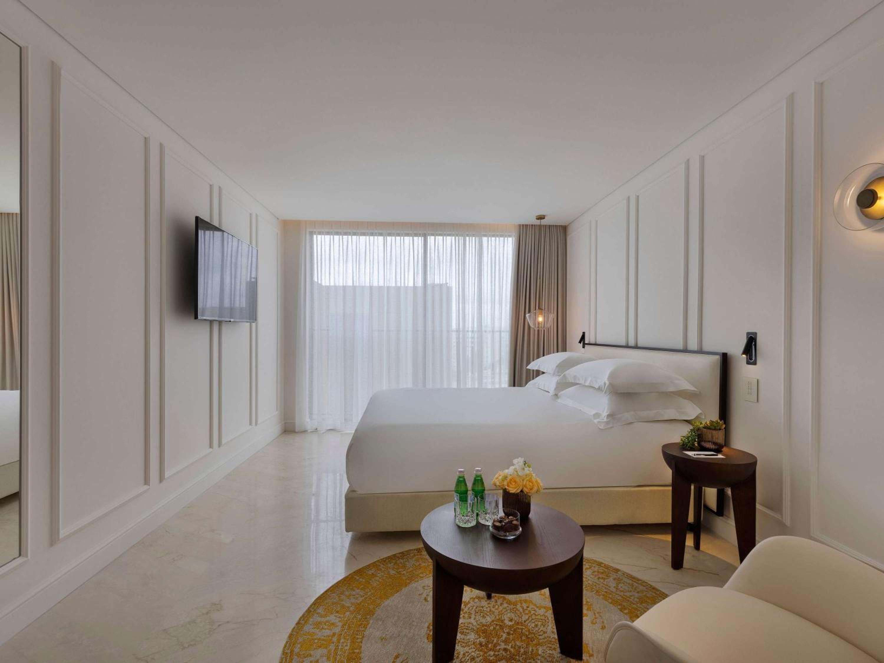One Bedroom Suite with One King Bed or Twin Beds and Sofa Bed - Photo 1