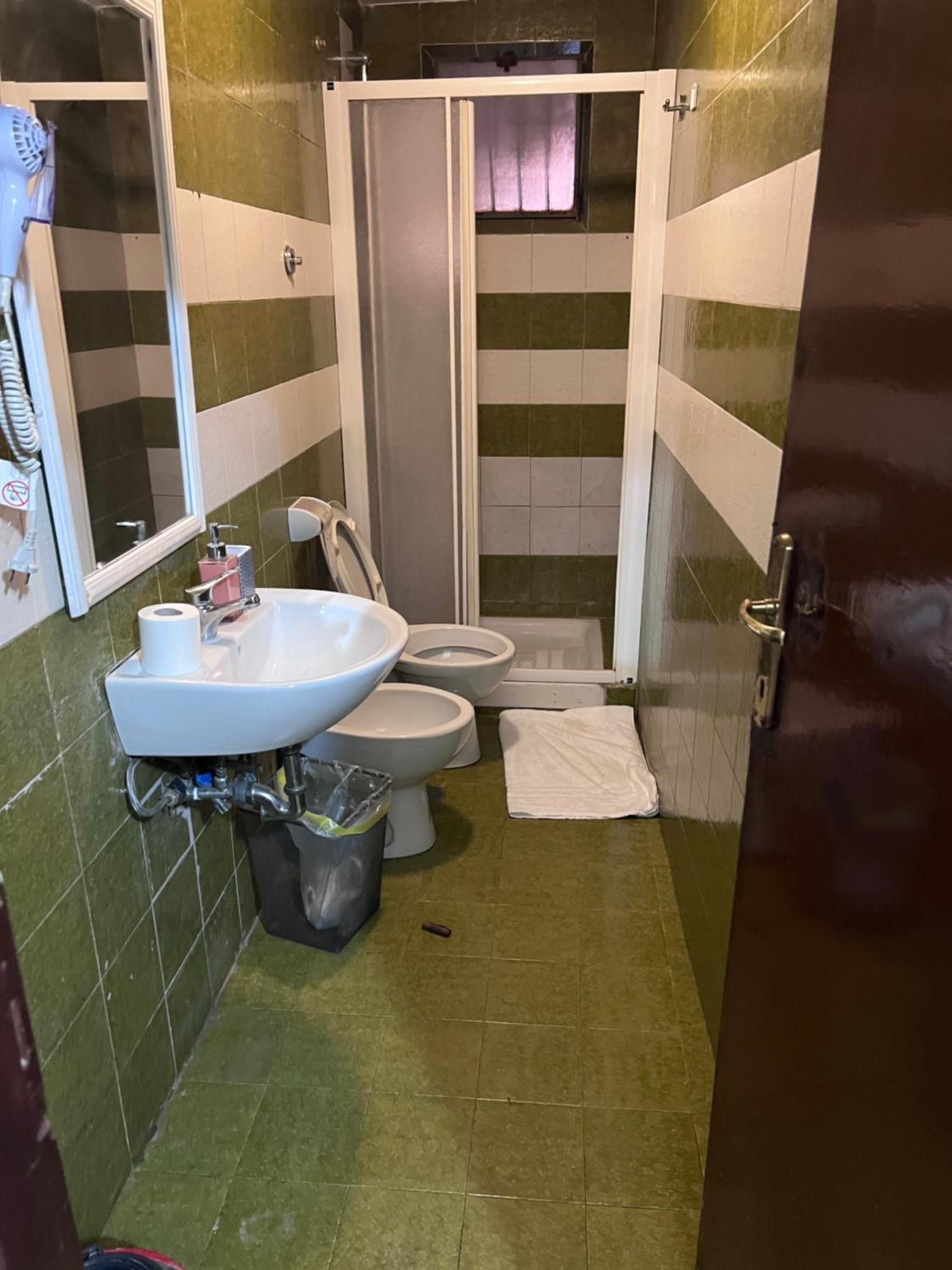 Economy Quadruple Room With Shared Bathroom photo 3