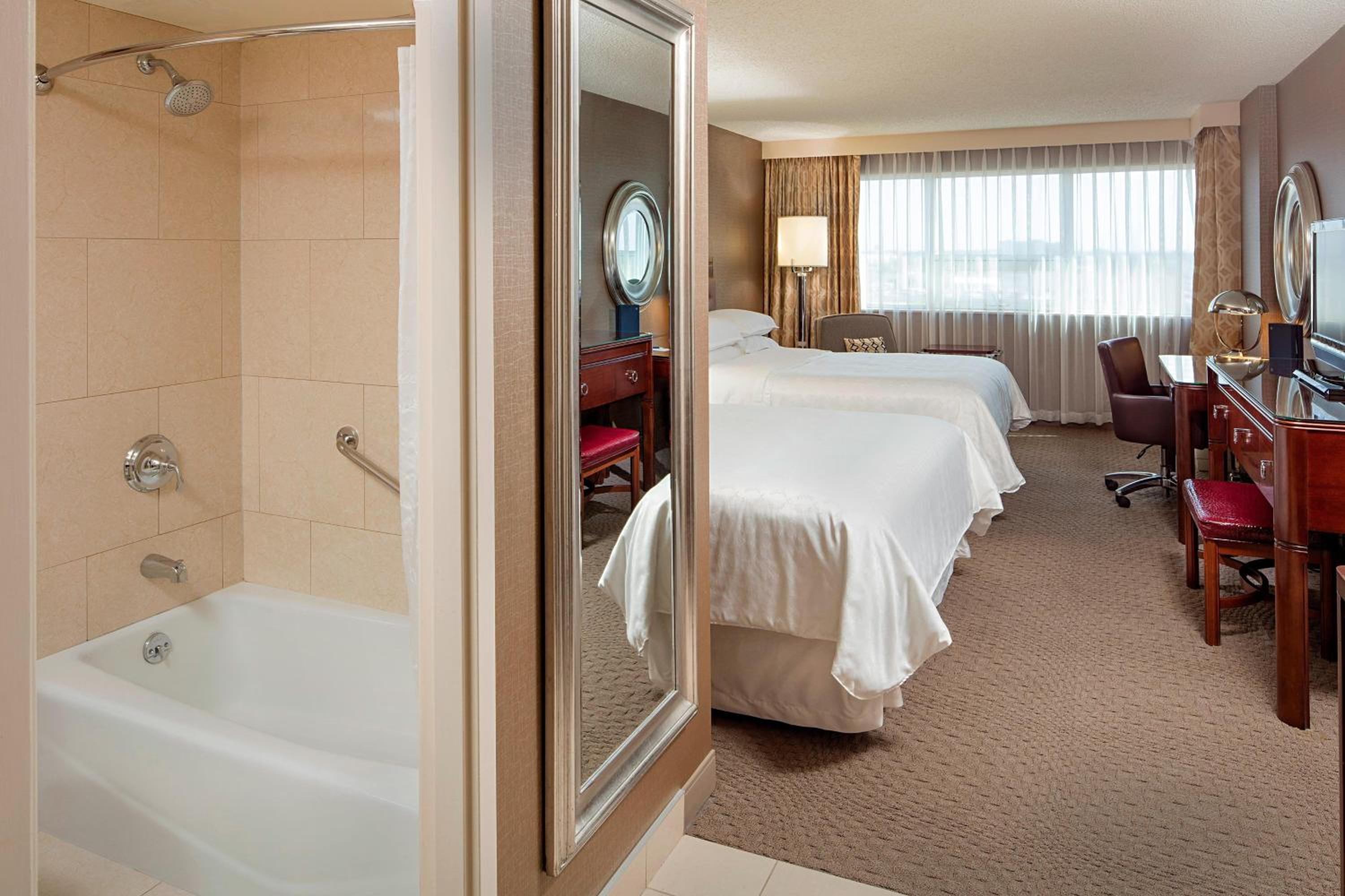Queen Room with Two Queen Beds - Photo 1