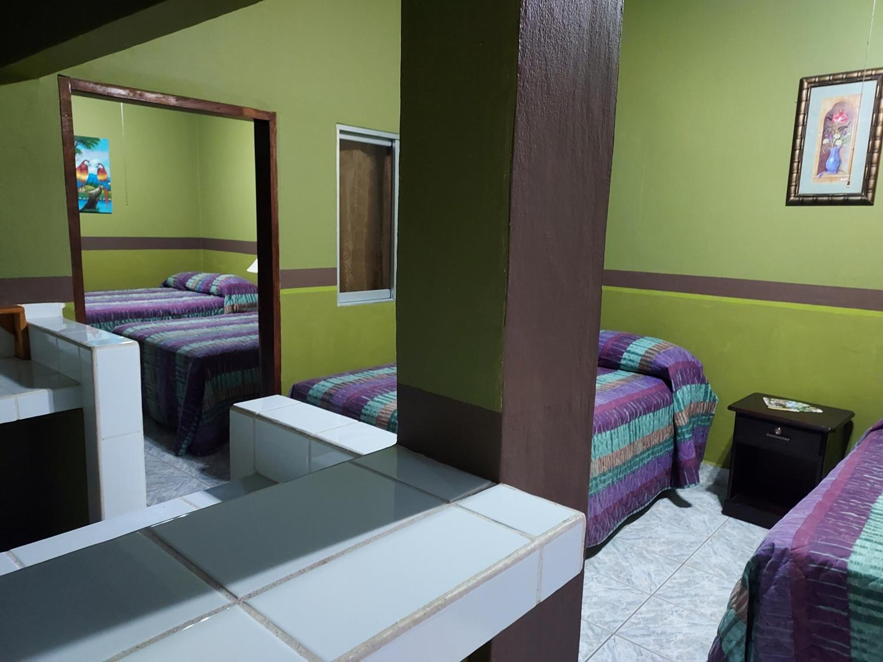 Quadruple Room with Private Bathroom photo 2