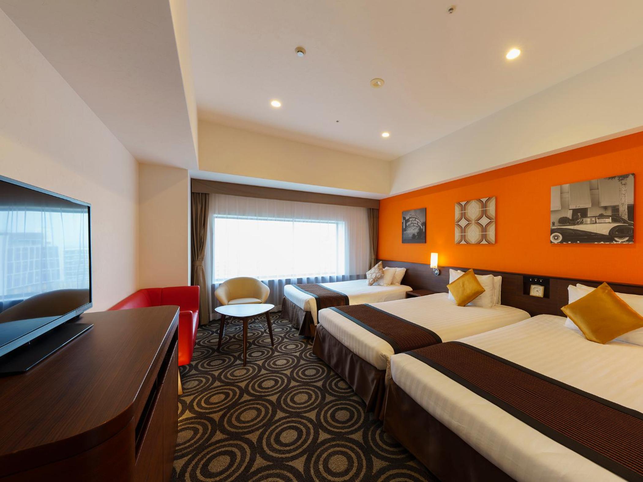 Superior Floor City View Triple Room - Photo 1
