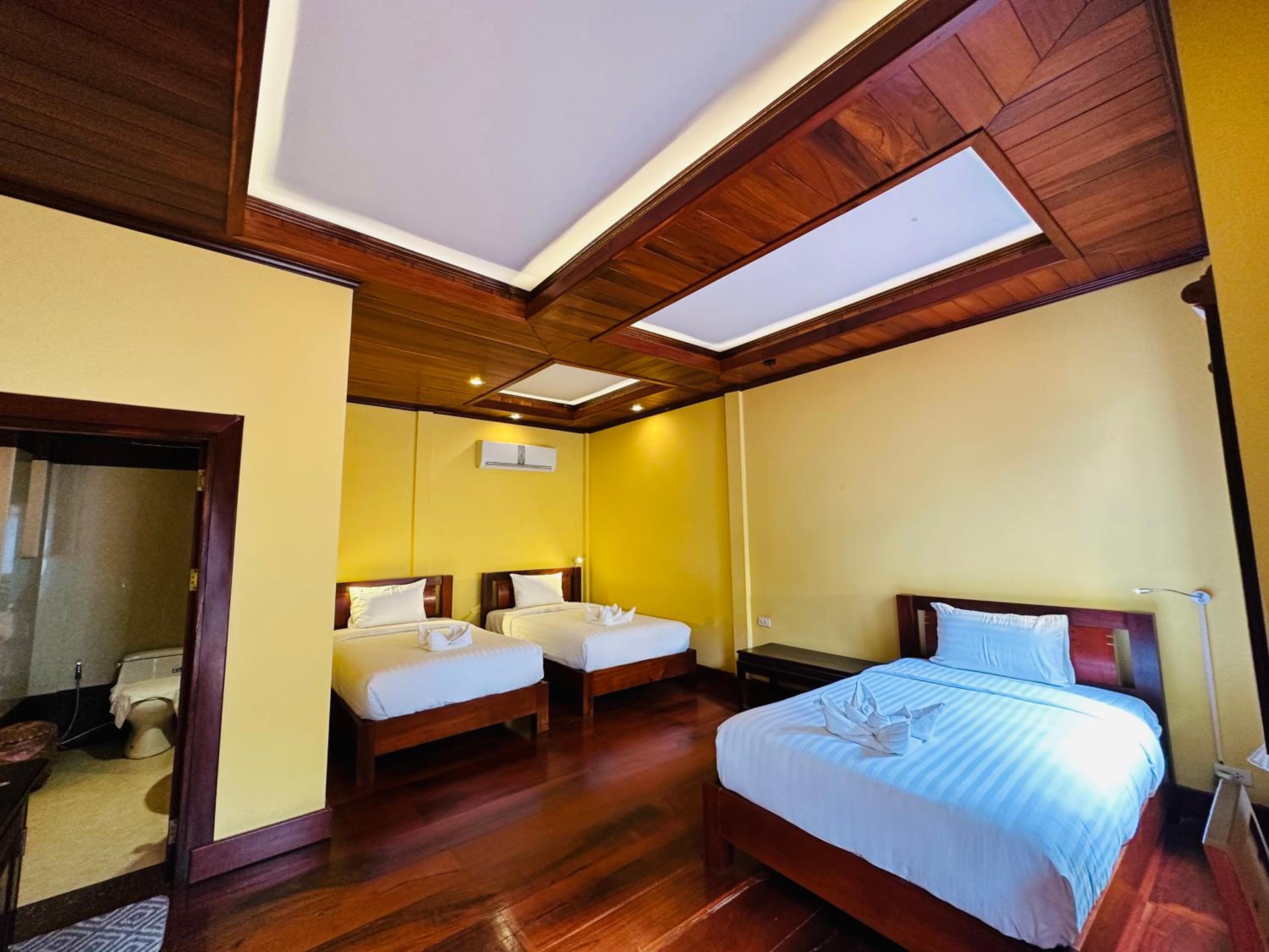 Deluxe Triple Room - Photo 1