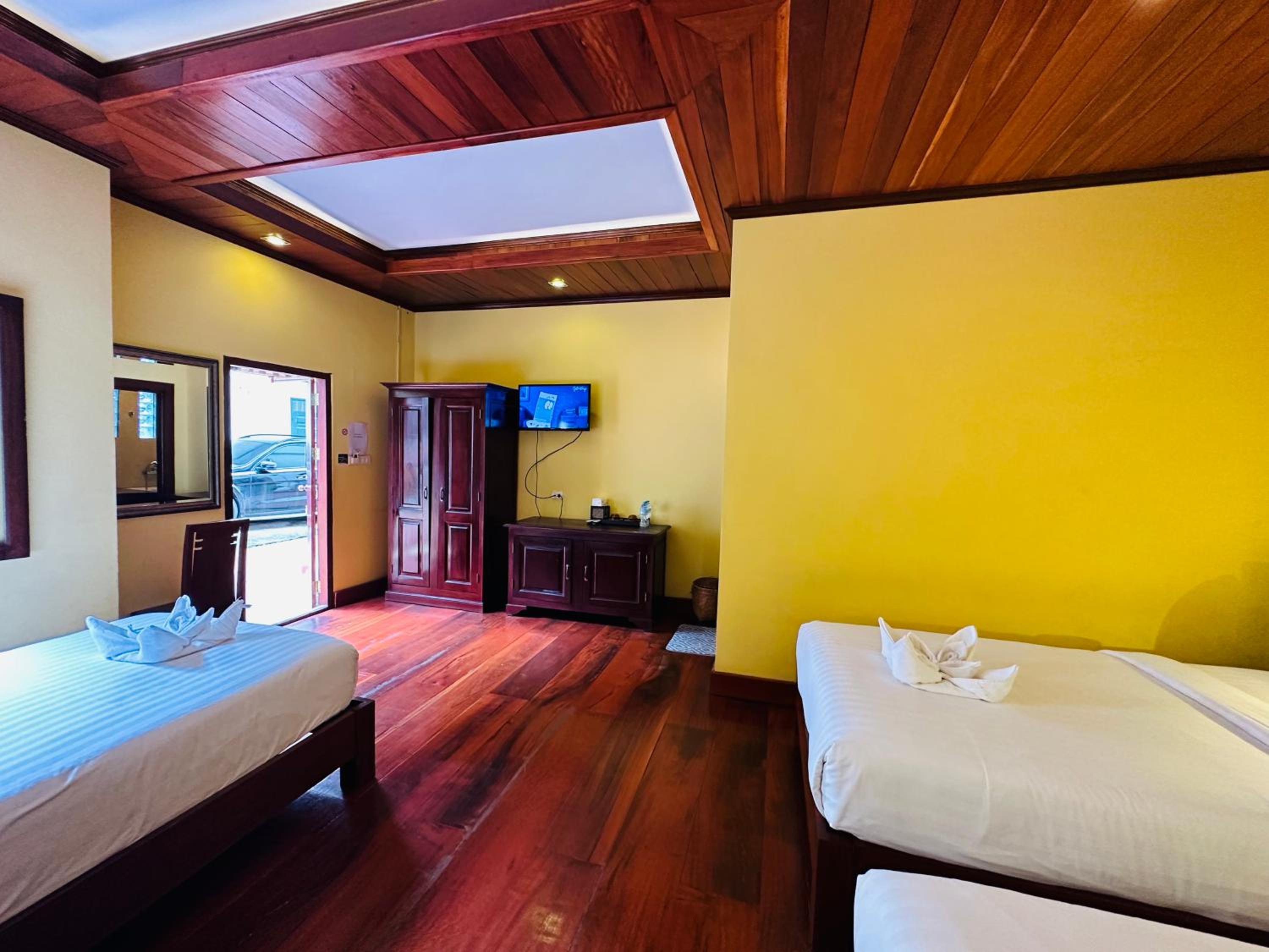 Deluxe Triple Room - Photo 19