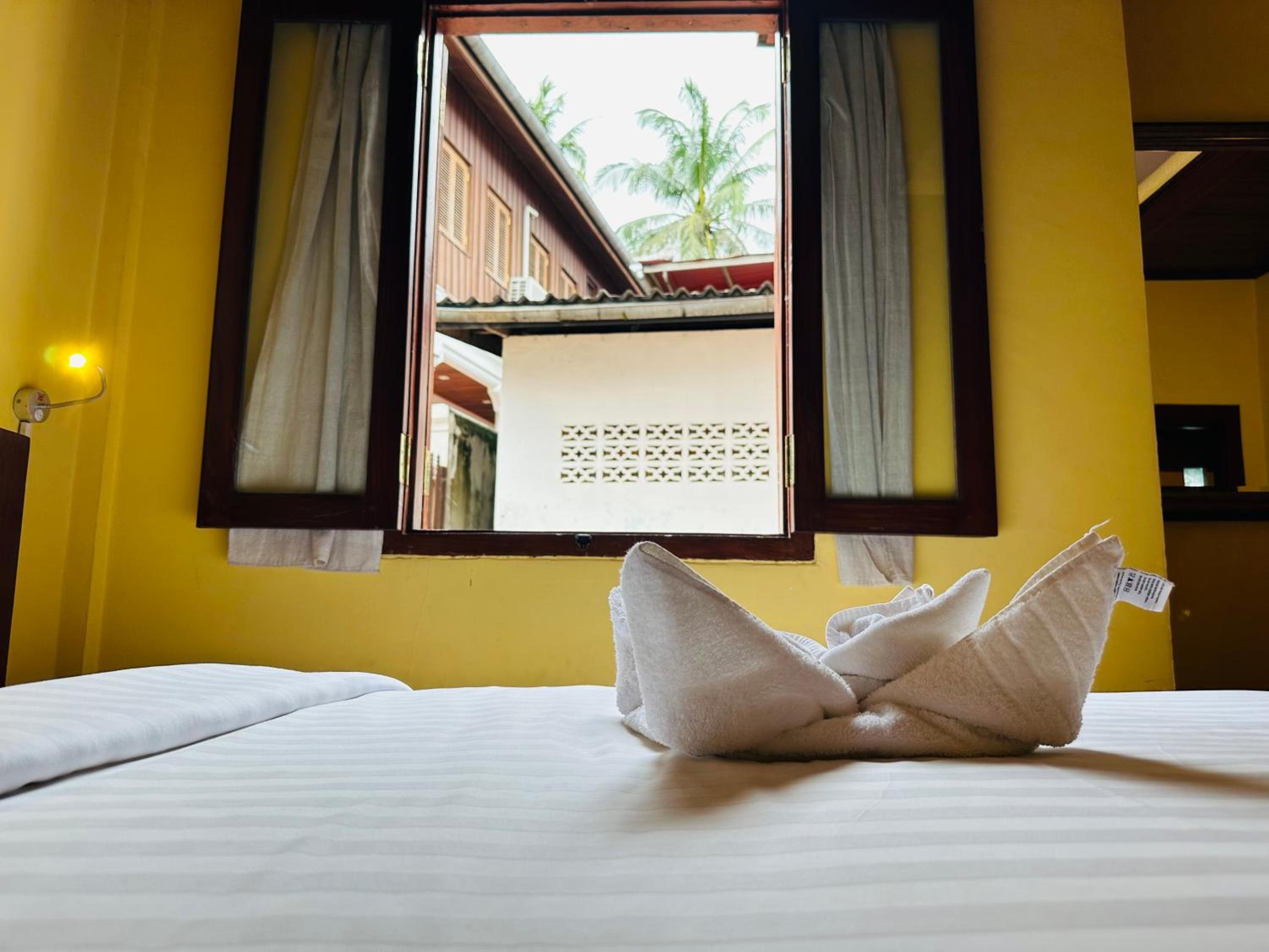 Deluxe Triple Room - Photo 17