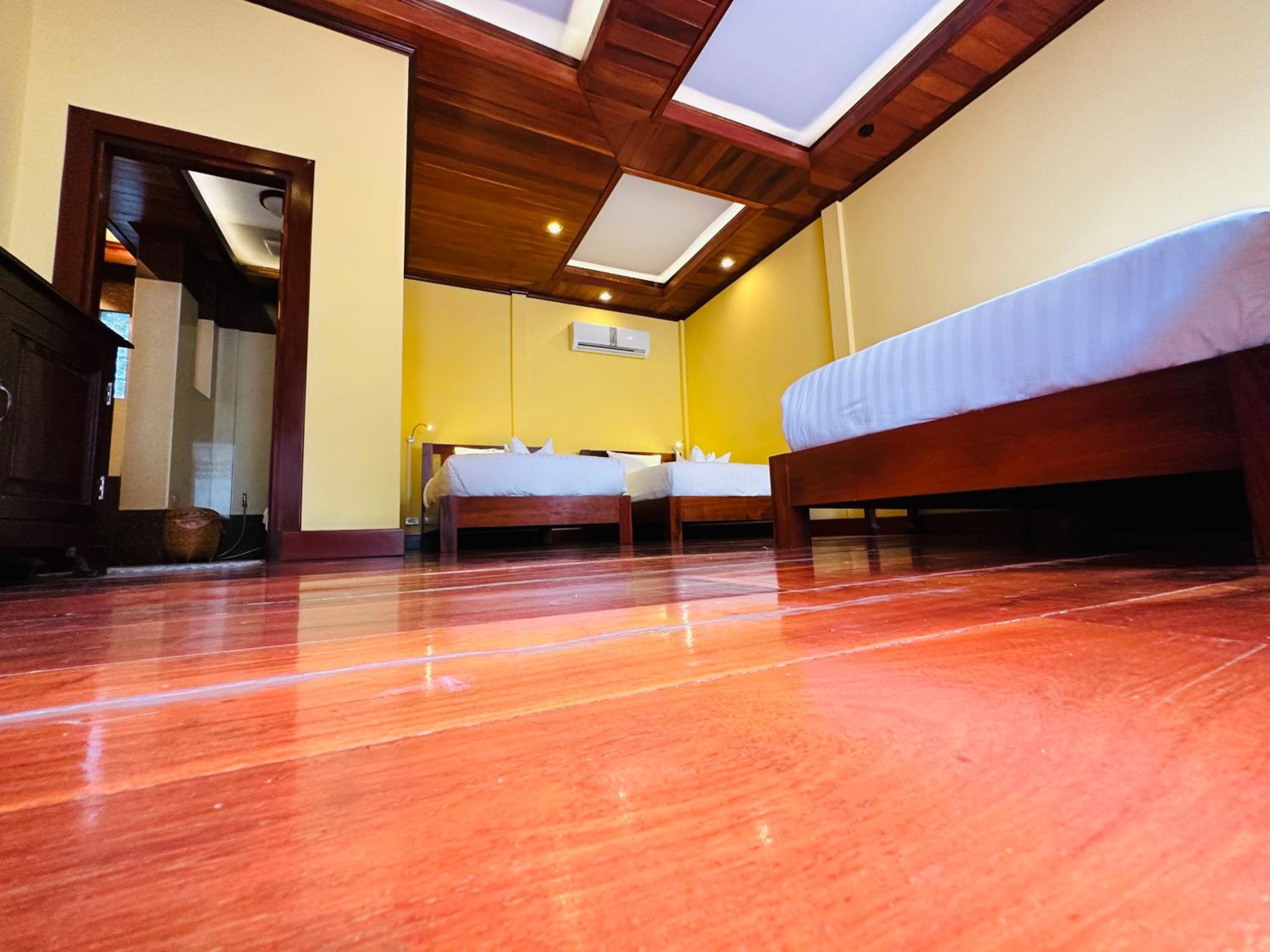 Deluxe Triple Room - Photo 20