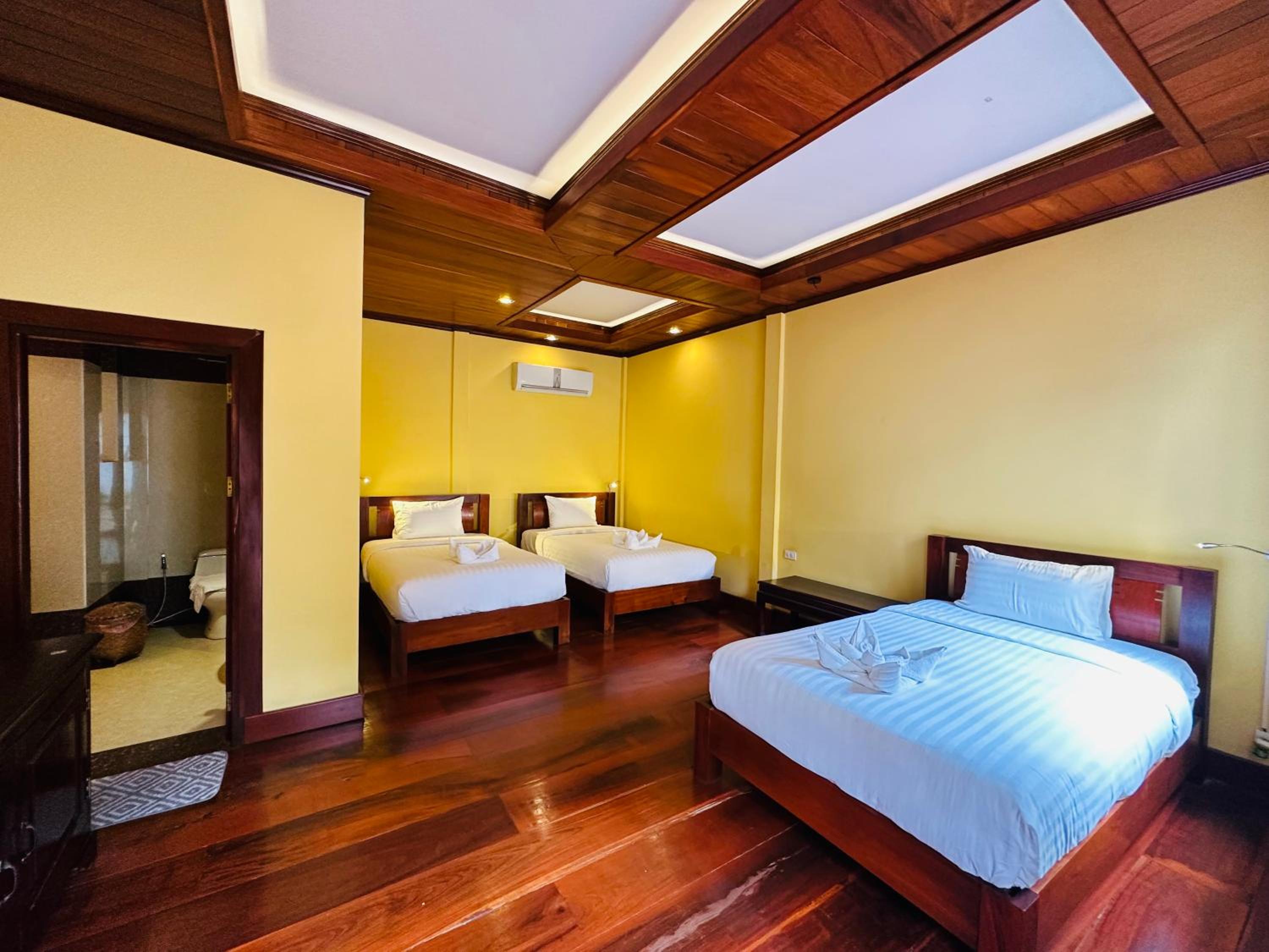 Deluxe Triple Room - Photo 7