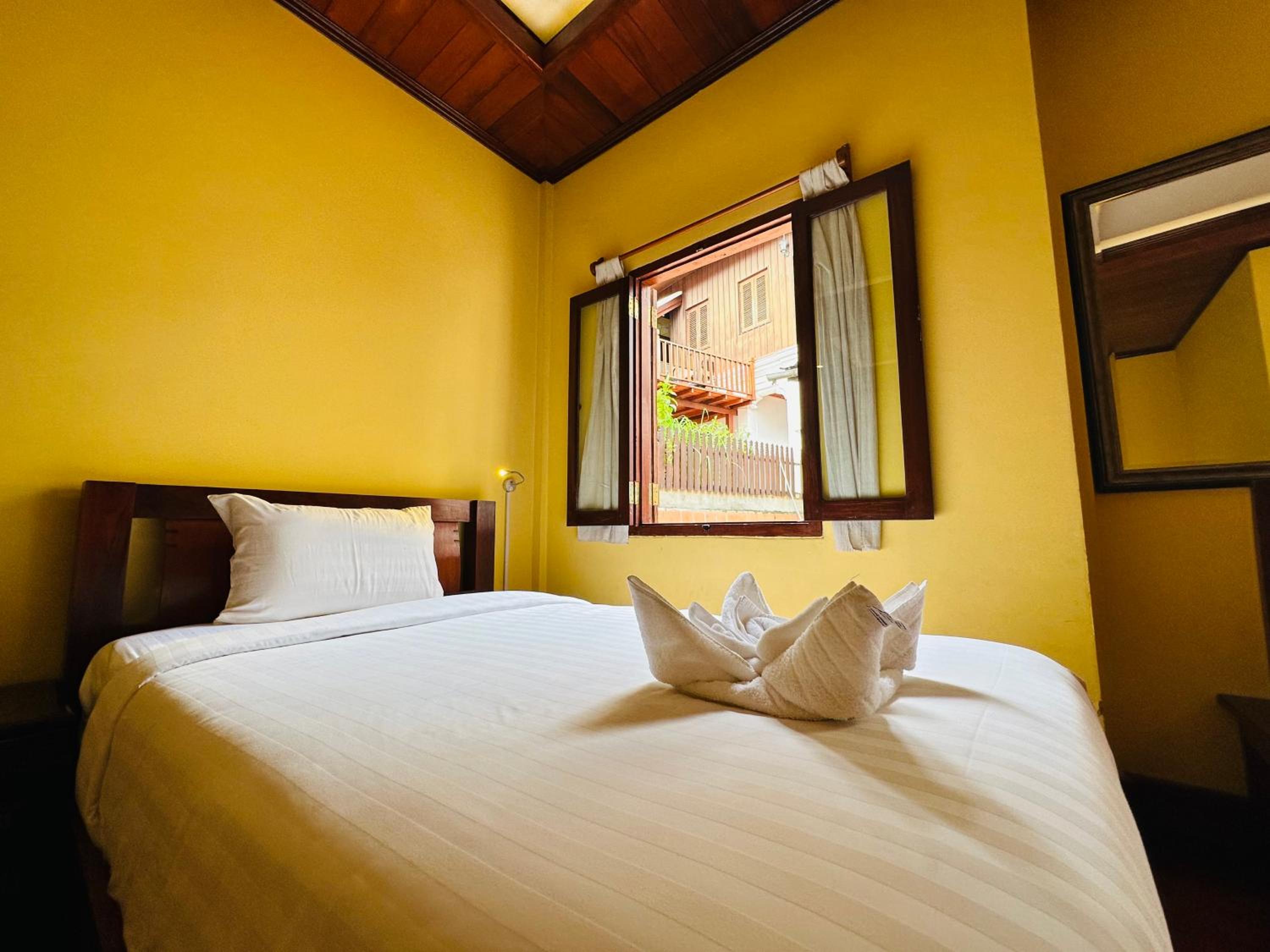 Deluxe Triple Room - Photo 15