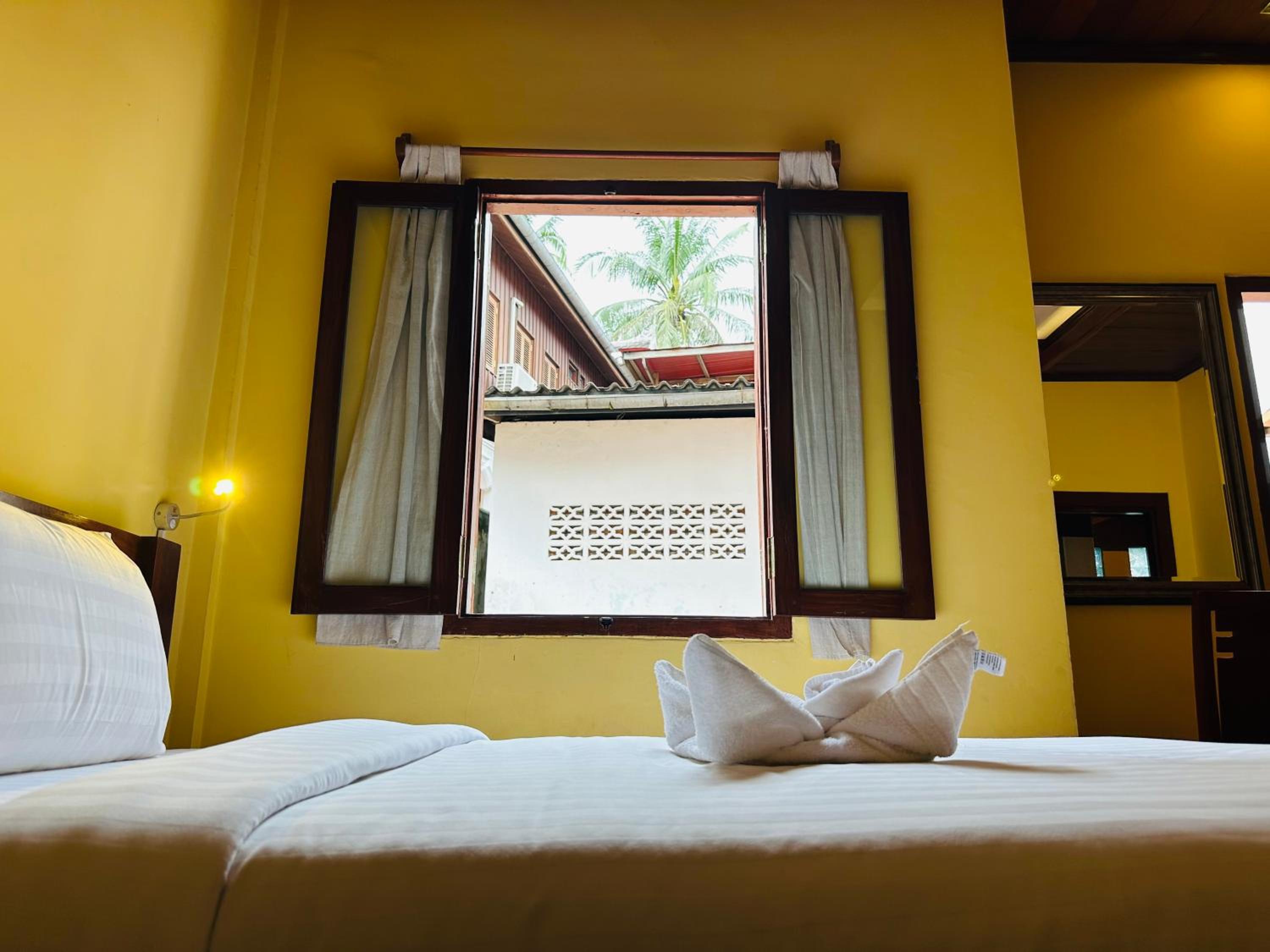 Deluxe Triple Room - Photo 9