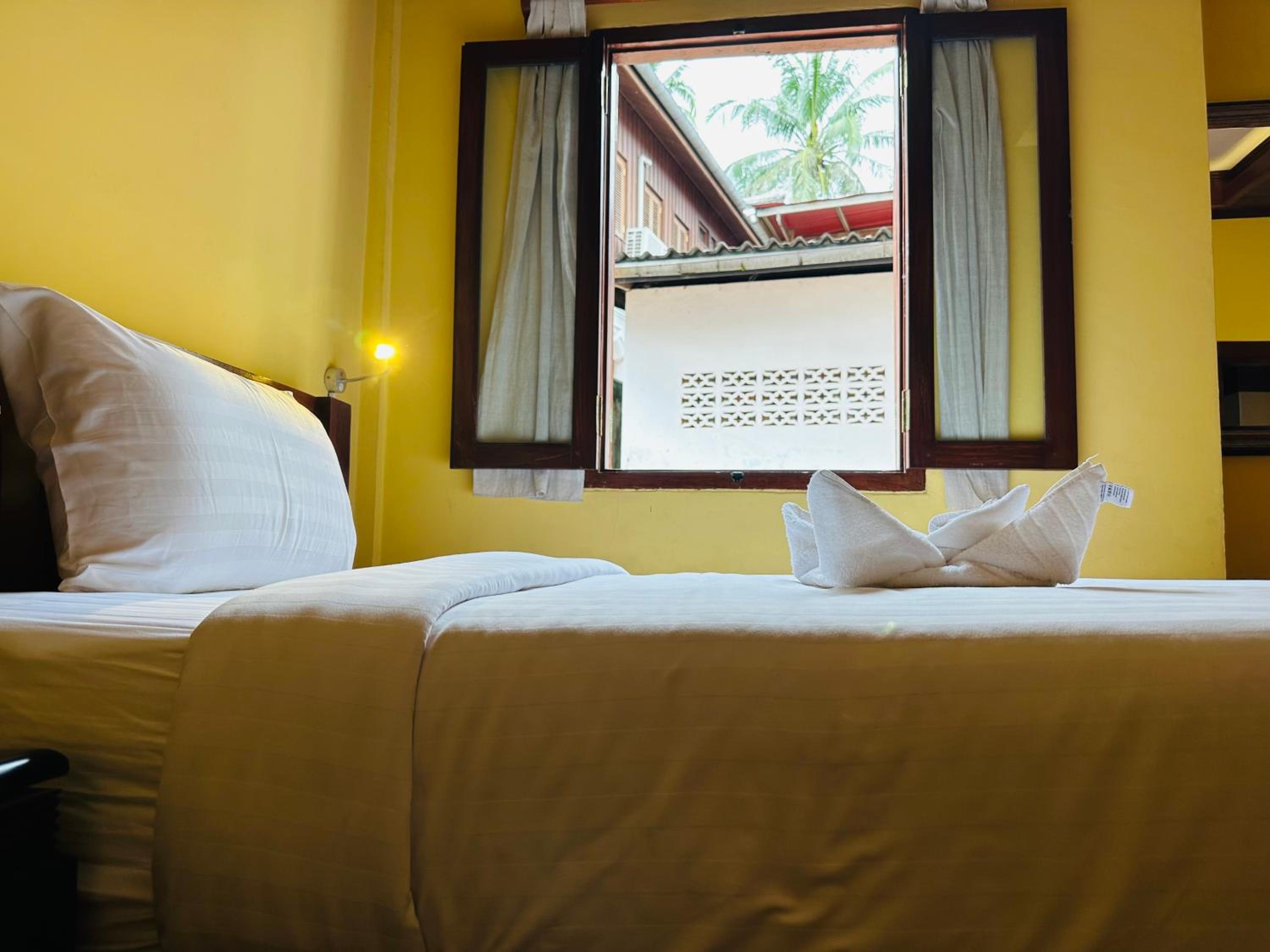 Deluxe Triple Room - Photo 12