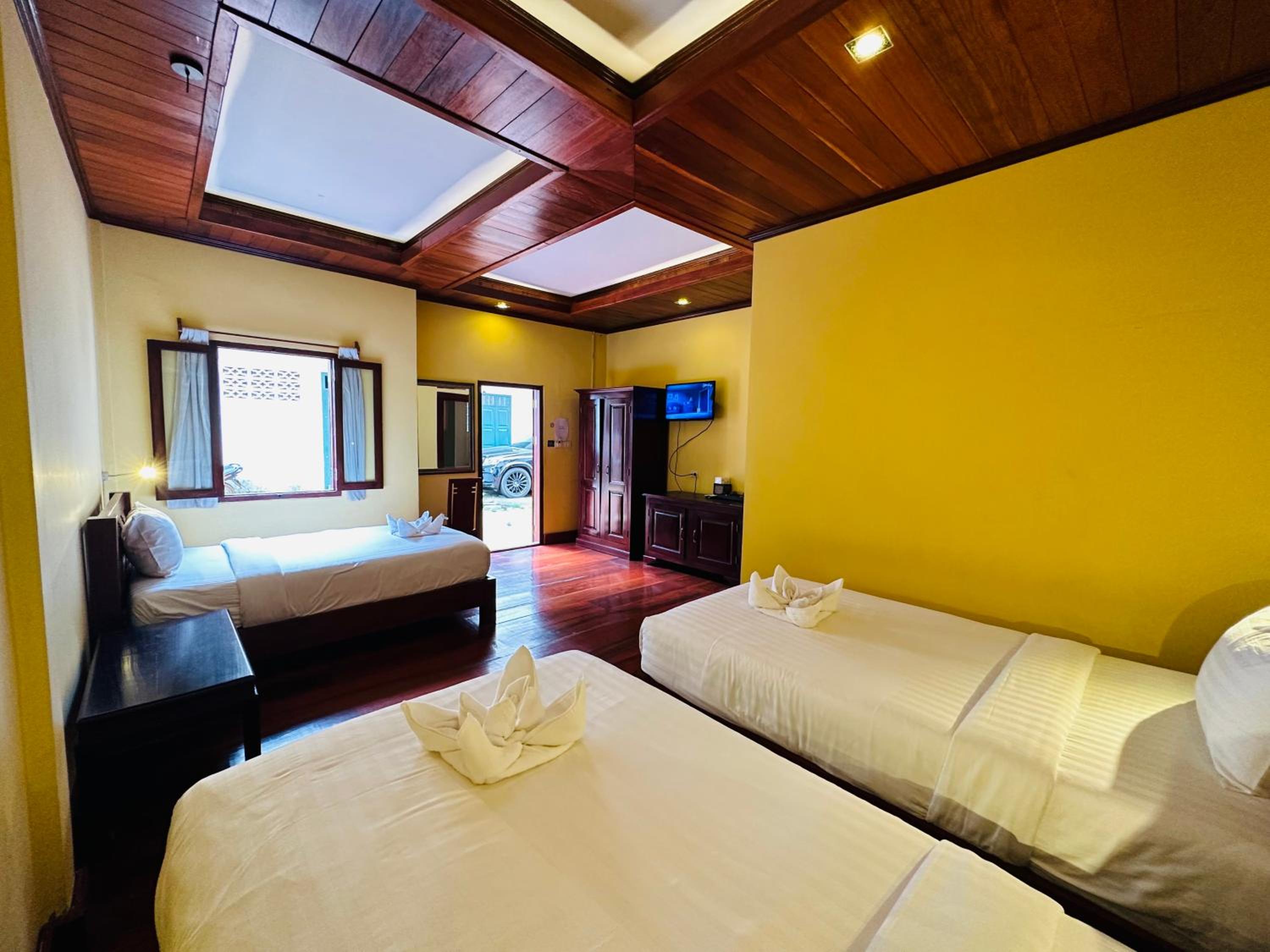 Deluxe Triple Room - Photo 10