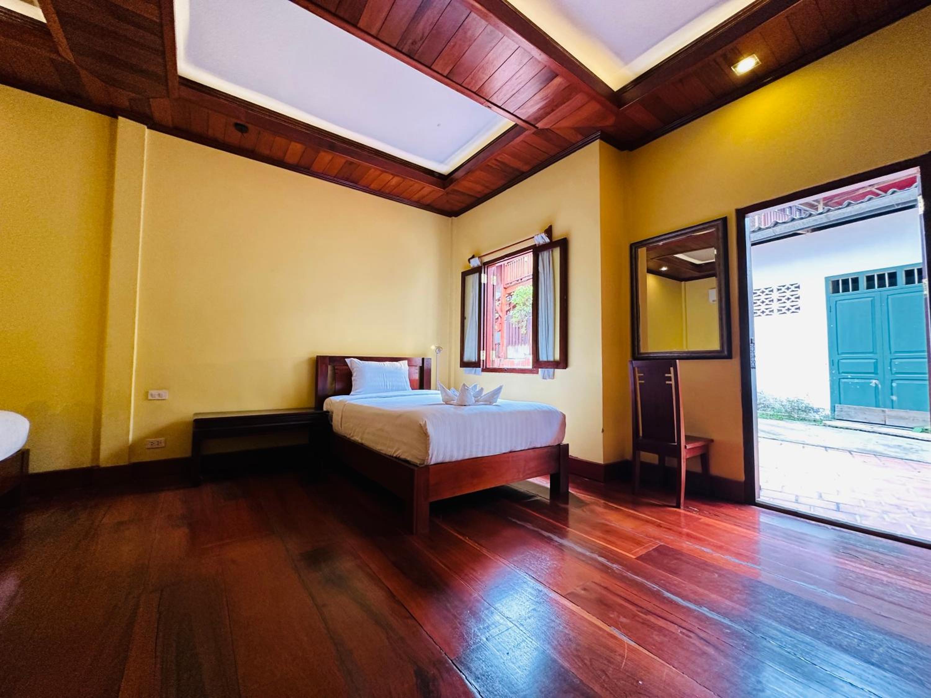 Deluxe Triple Room - Photo 8