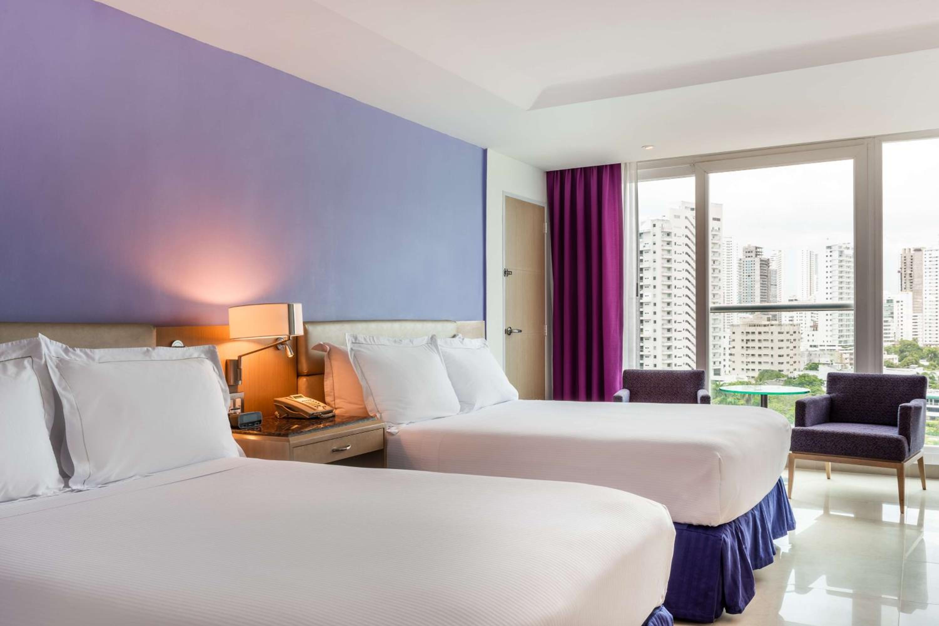 Queen Room with Two Queen Beds and City View - Photo 1