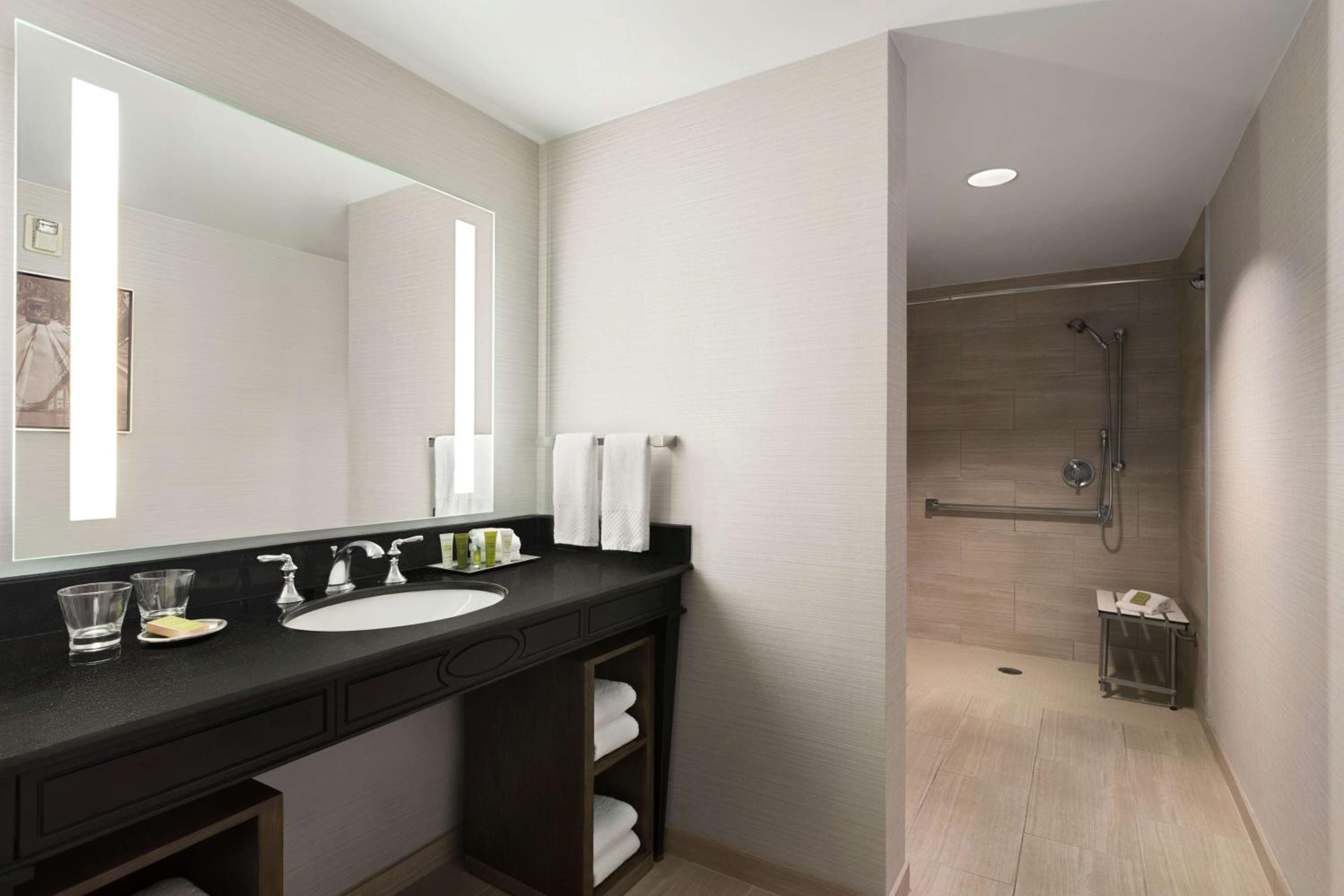 Relax in a sleek, modern bathroom retreat.