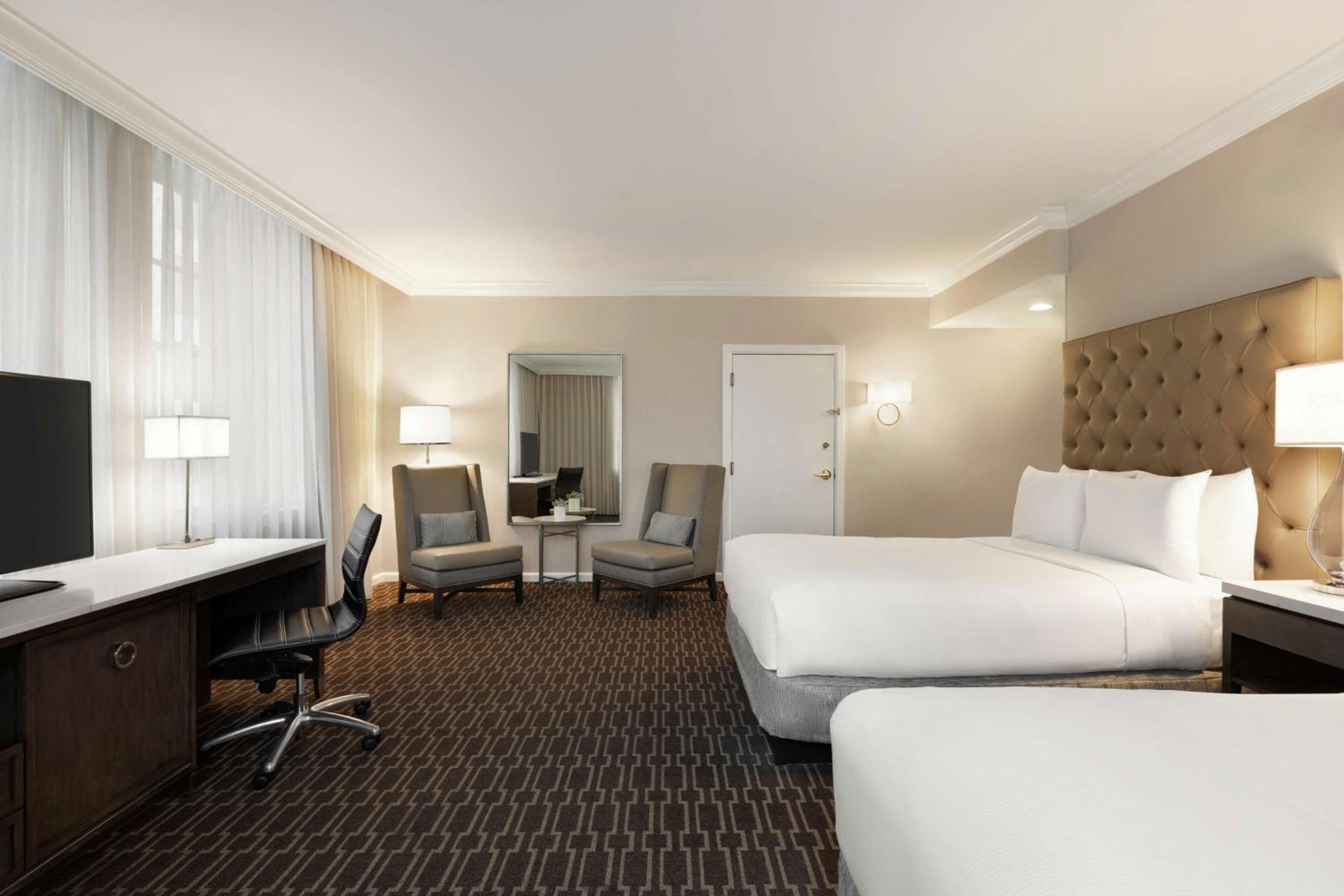 Relax in style in our comfortable hotel room.