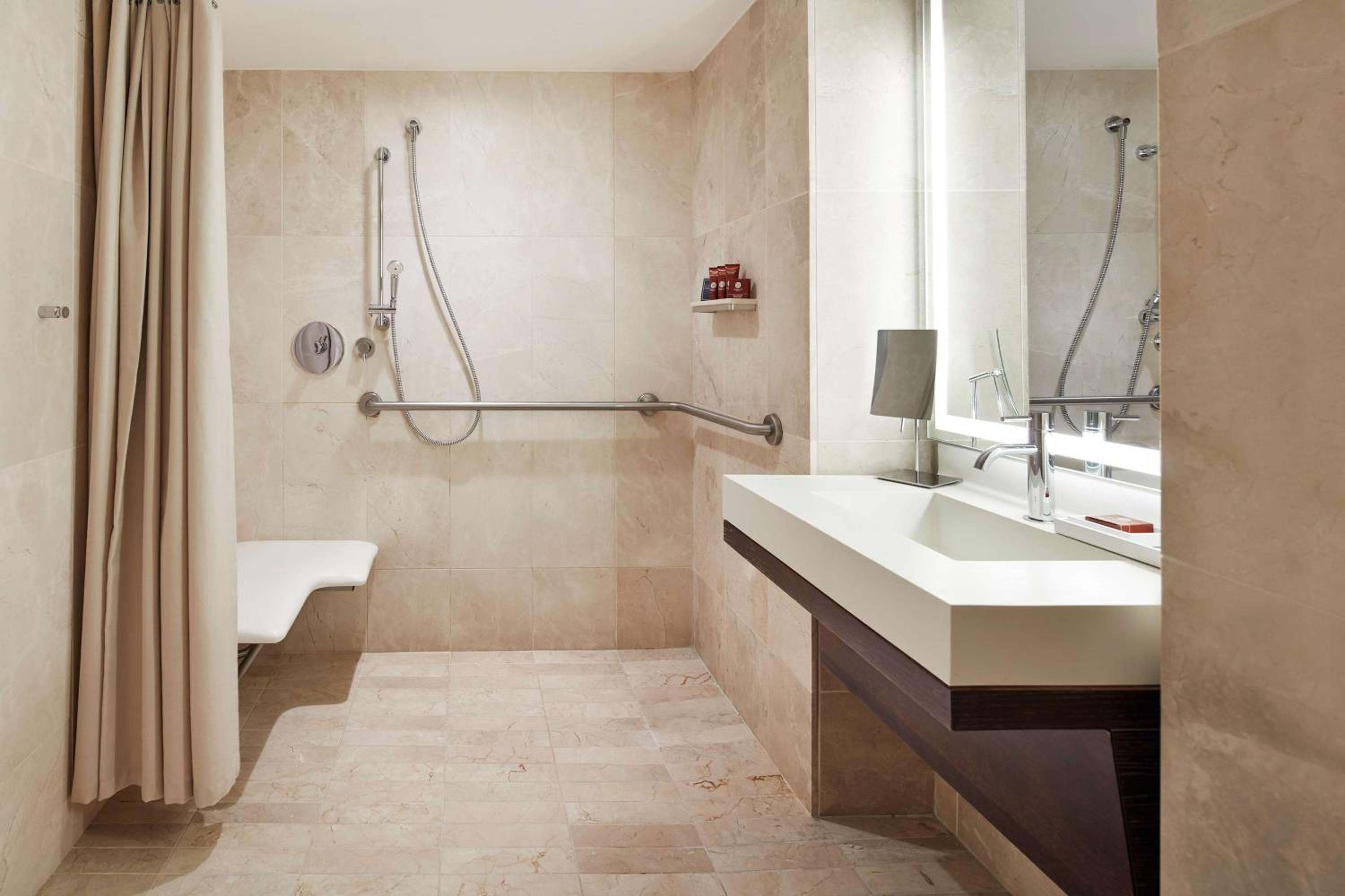 Deluxe Suite with Two Double Beds and Roll-in Shower - Mobility Access