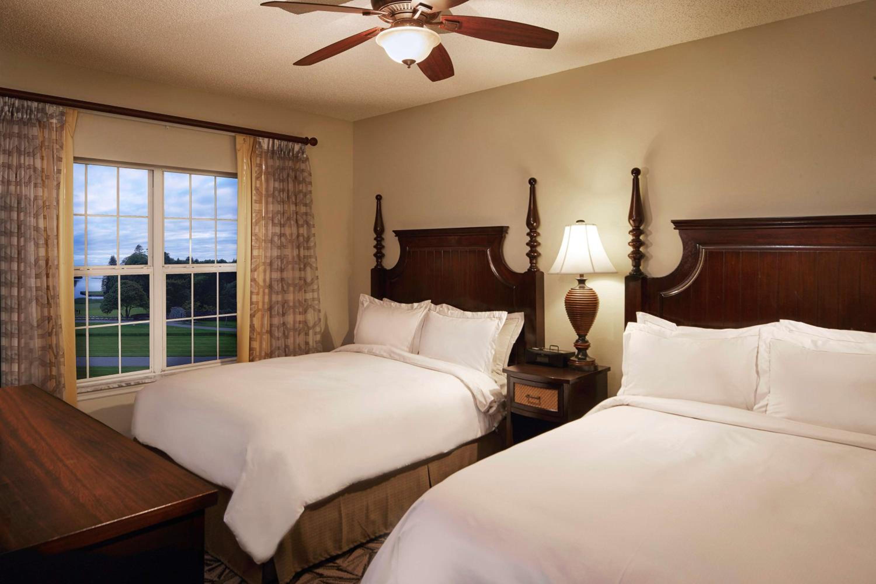 Three-Bedroom King Suite with Four Queen Beds and Sofa Bed