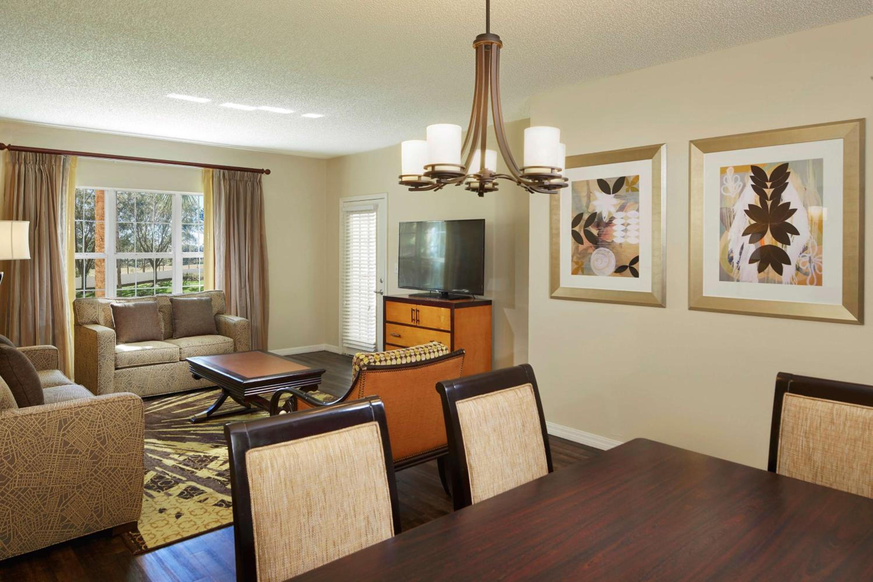 Three-Bedroom King Suite with Four Queen Beds and Sofa Bed
