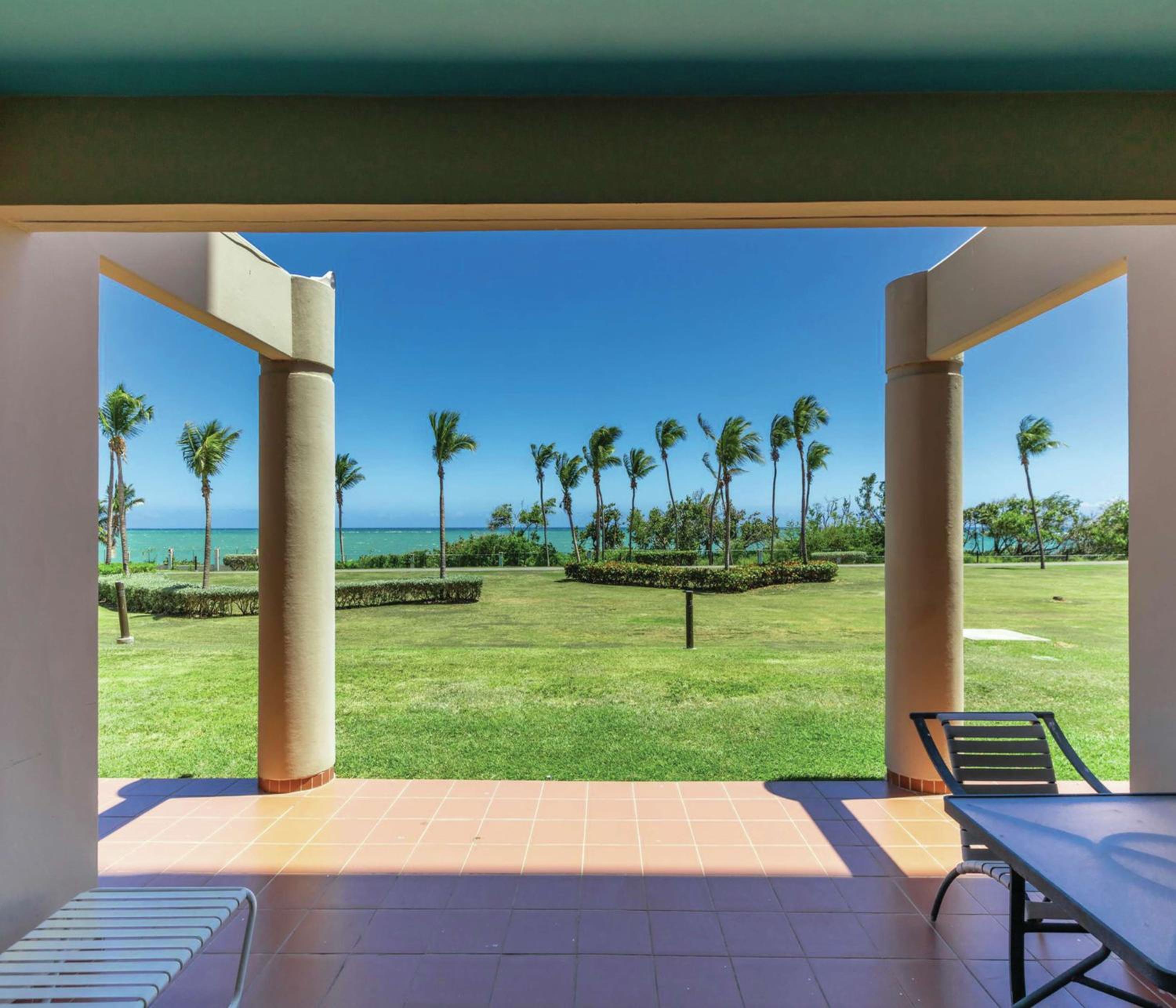 Deluxe King Room with Ocean View and Patio Access - Photo 4