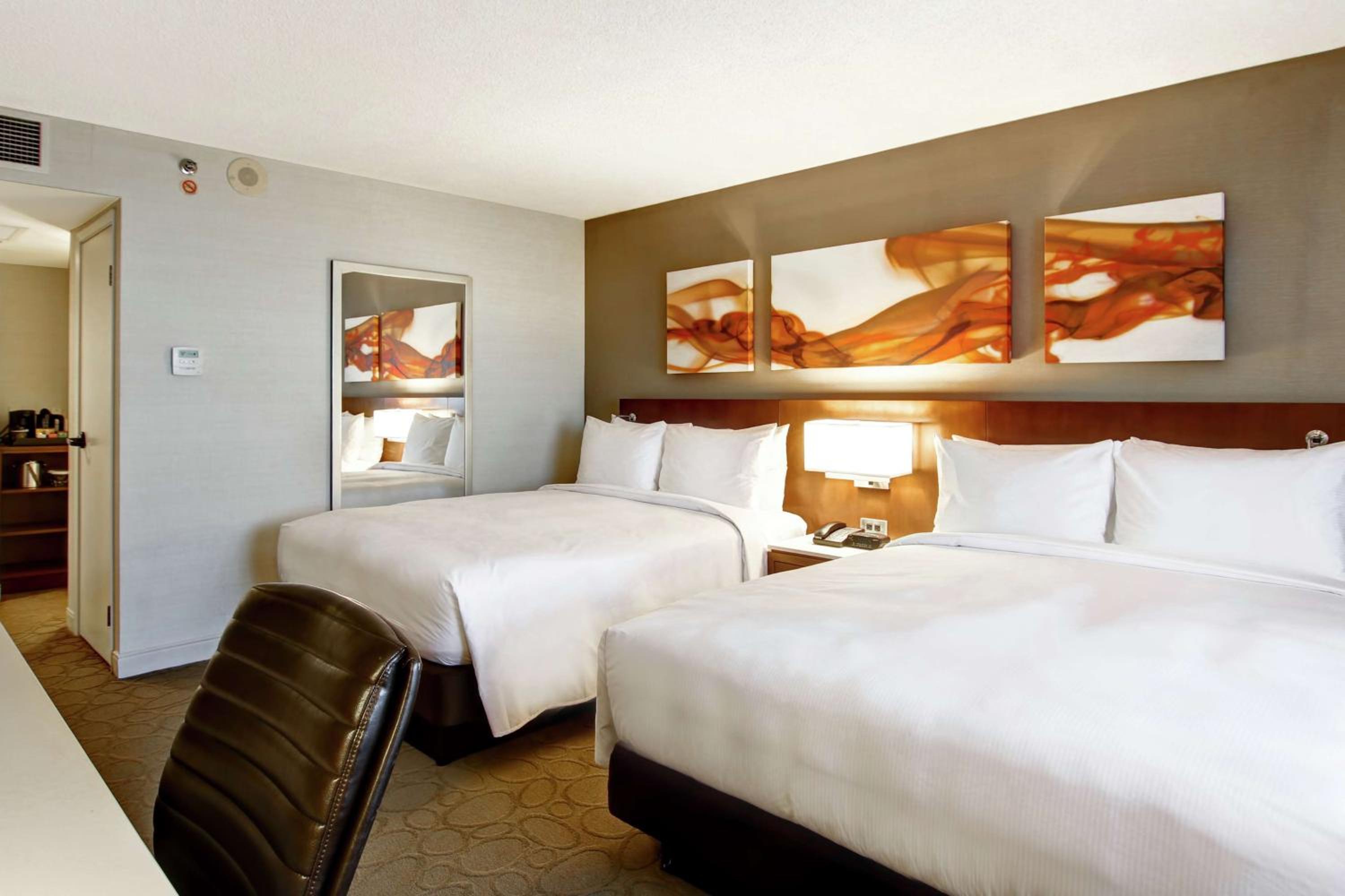 Queen Room with Two Queen Beds - Photo 1