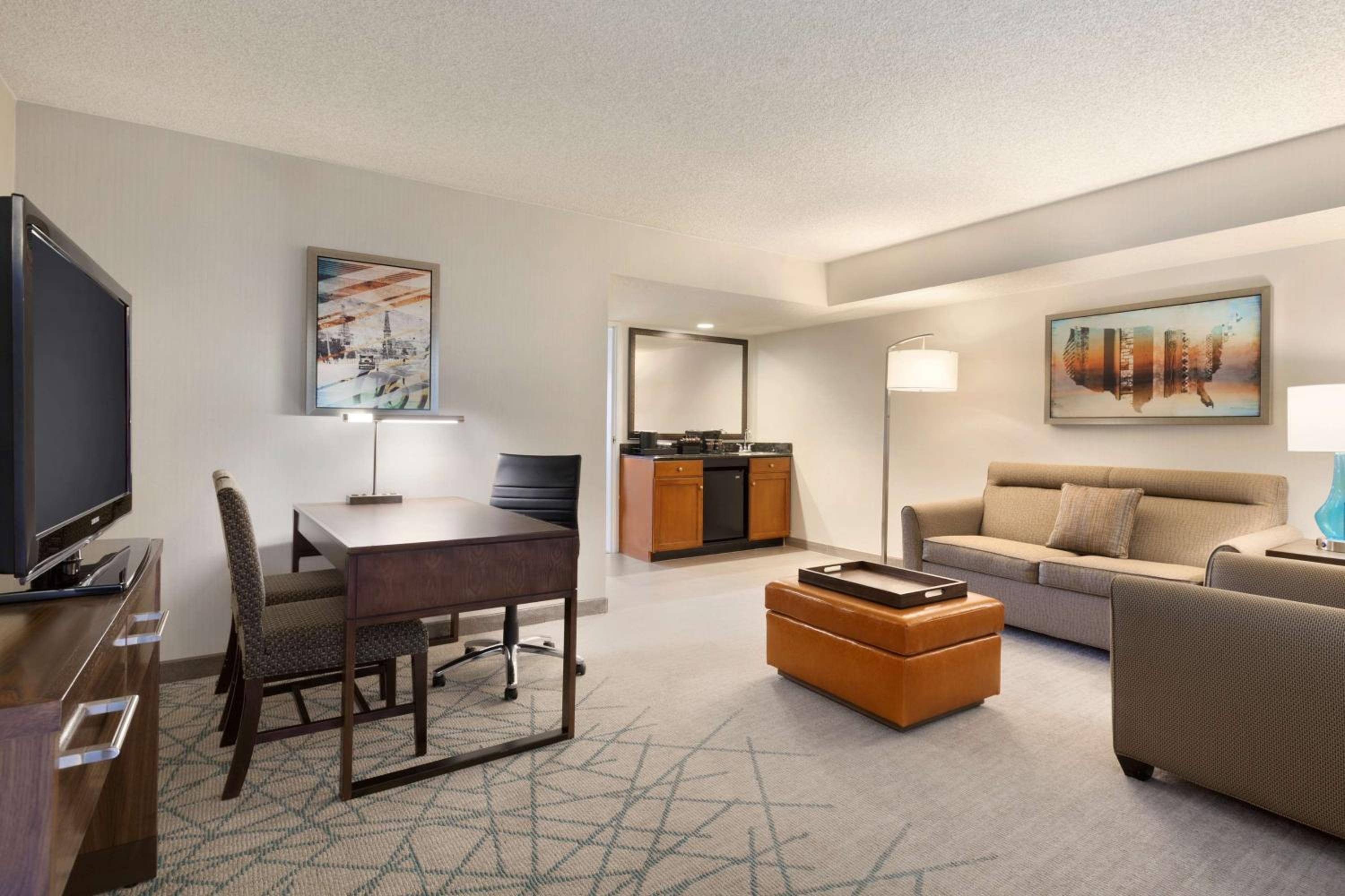Two-Room Corner King Suite with Sofa Bed - Photo 1
