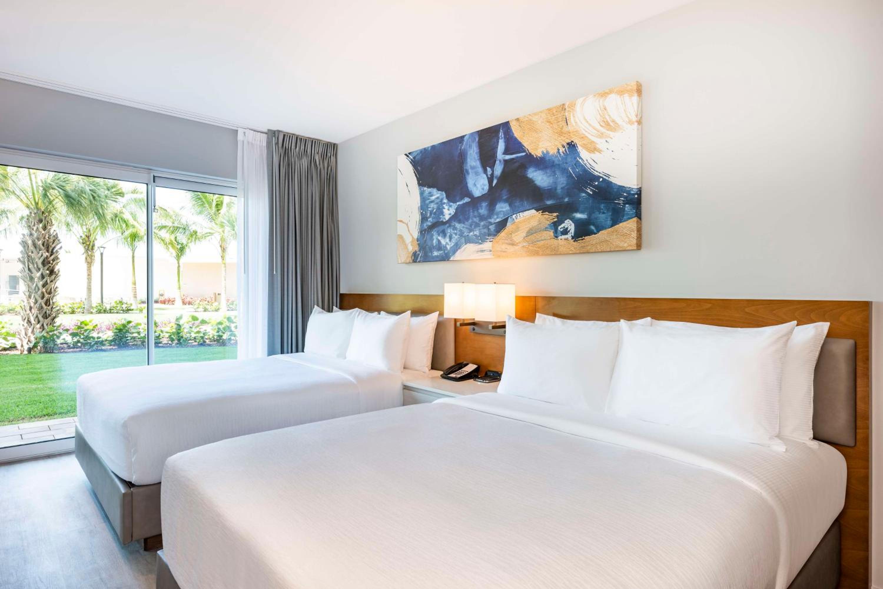 One Bedroom Suite with Two Queen Beds and Pool/Patio - Photo 1