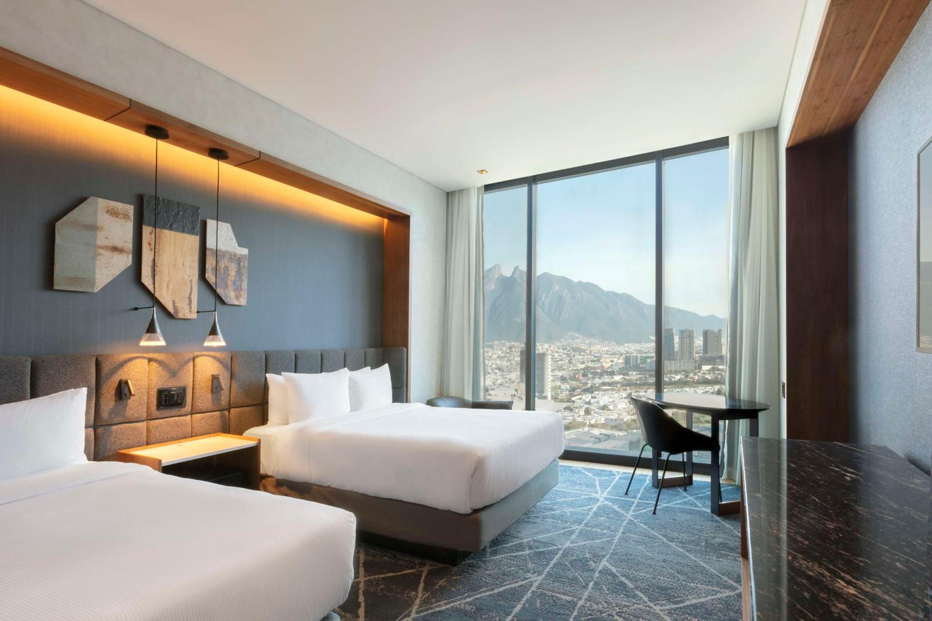 Deluxe Queen Room with Two Queen Beds - Photo 1
