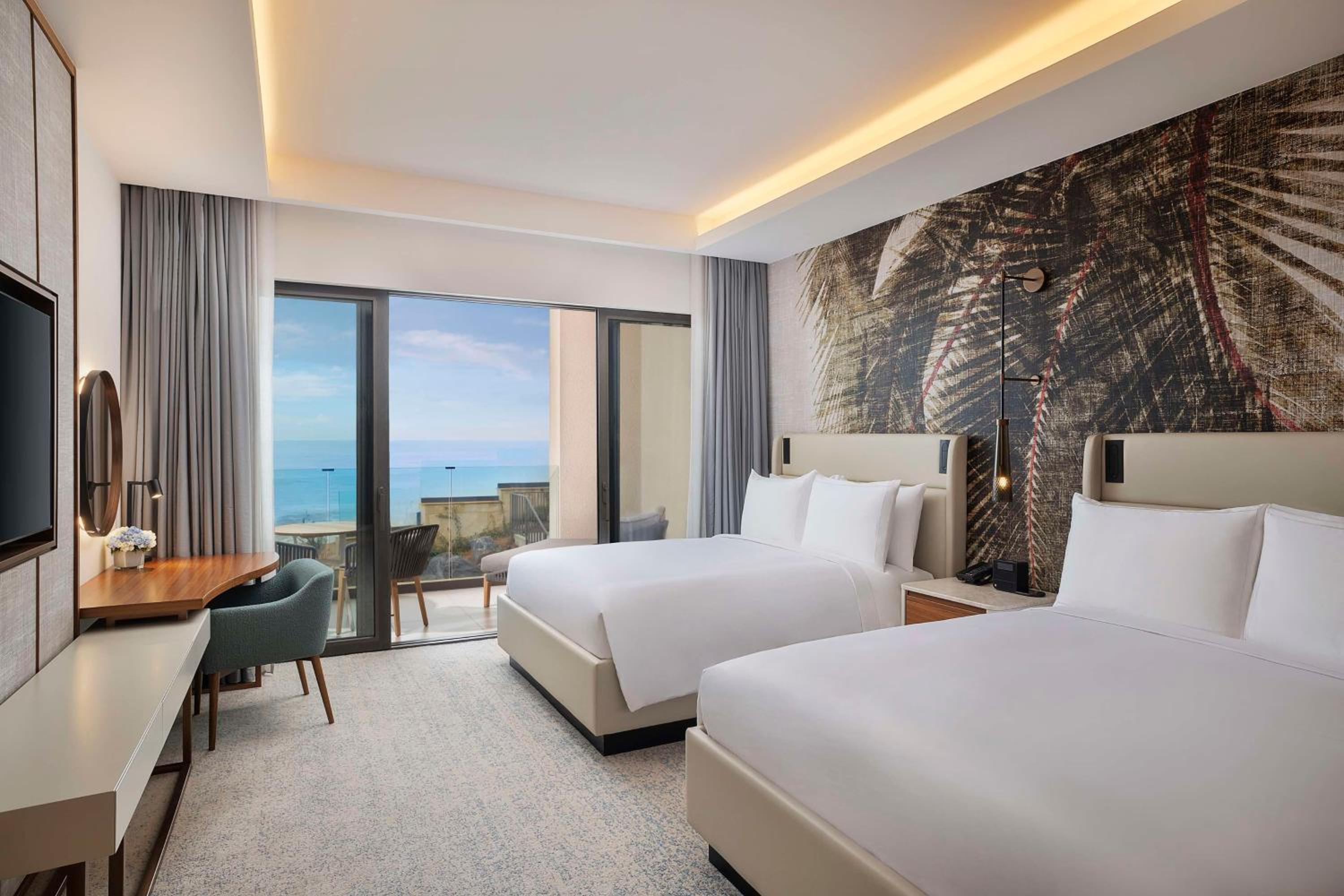 Deluxe Queen Room with Two Queen Beds and Ocean View - Photo 1