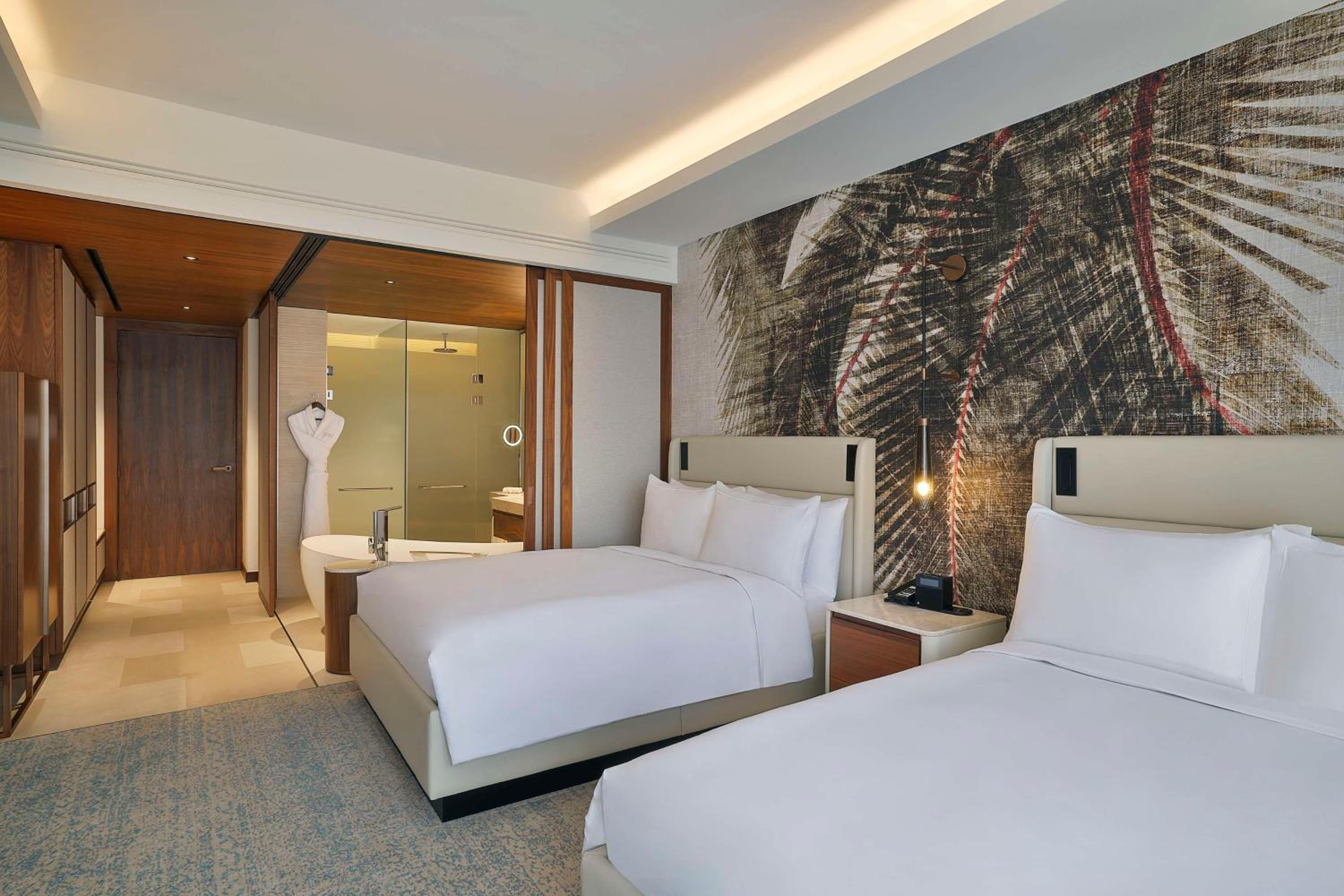 Deluxe Queen Room with Two Queen Beds - Photo 1