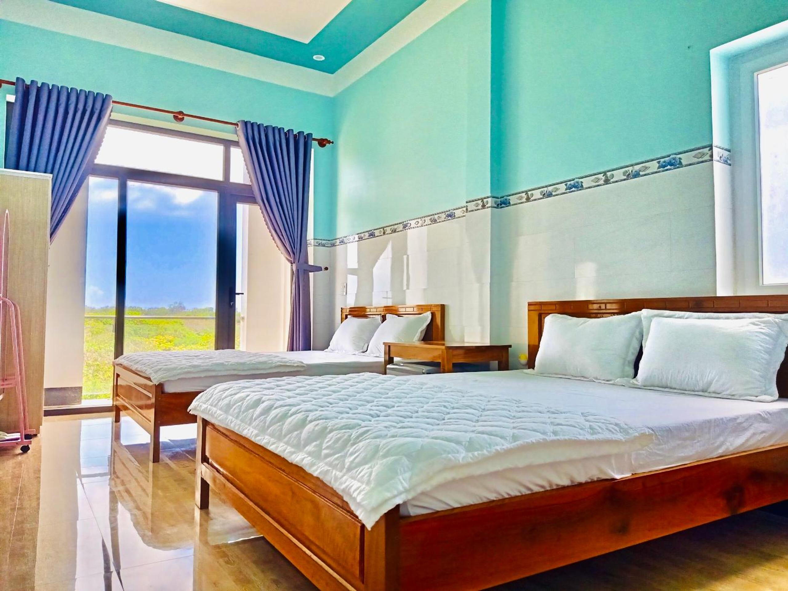Quadruple Room with Balcony