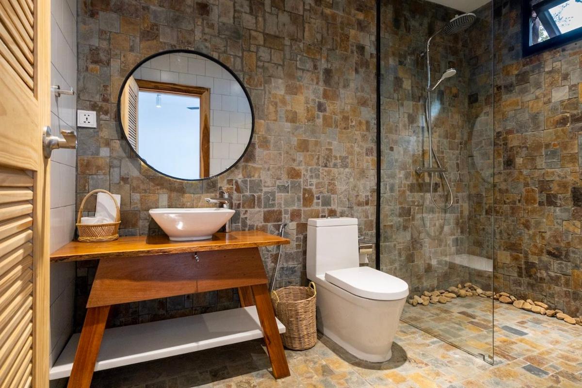 Three-Bedroom House - Photo 19