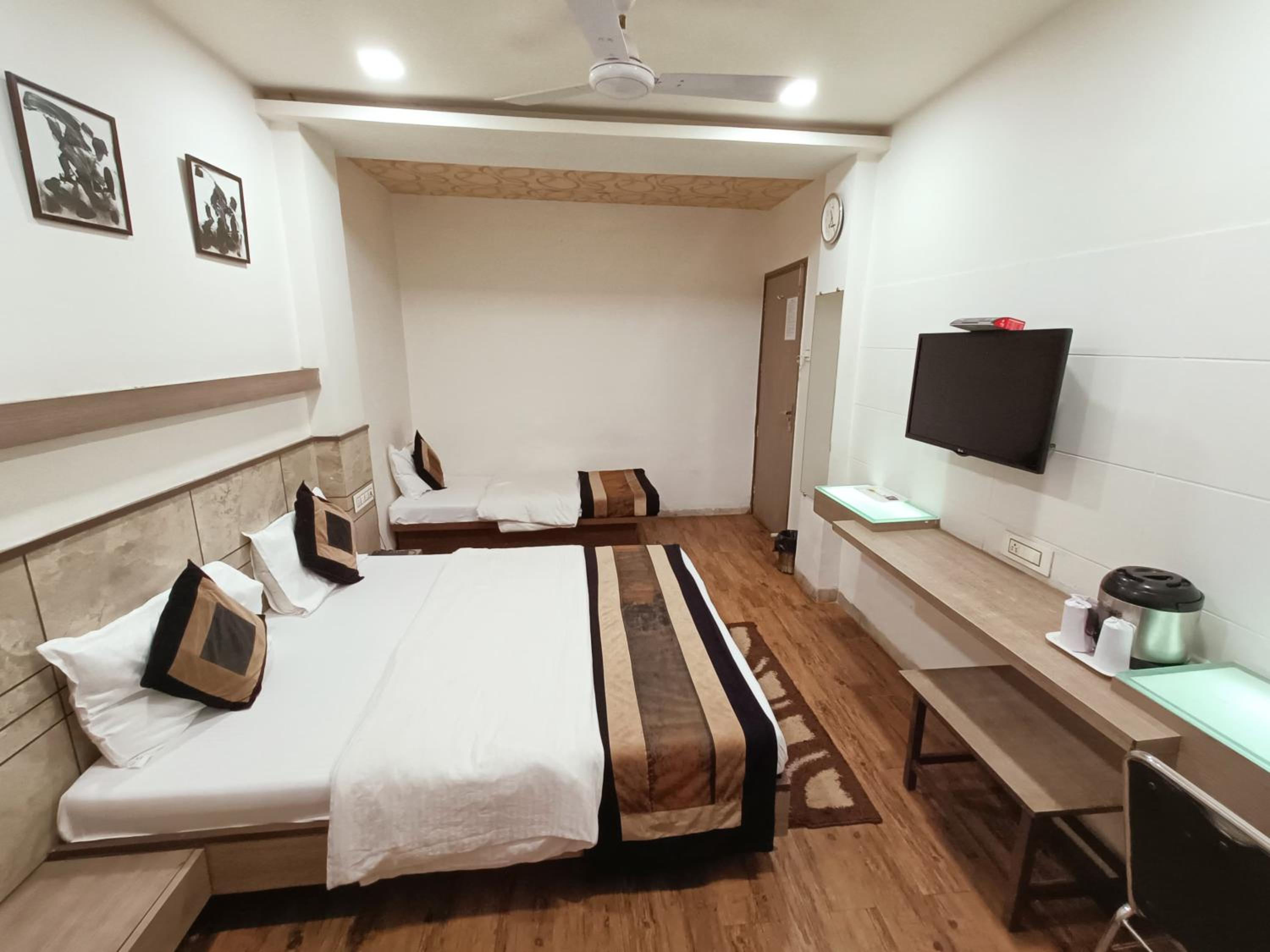 Deluxe Triple Room - Photo 1