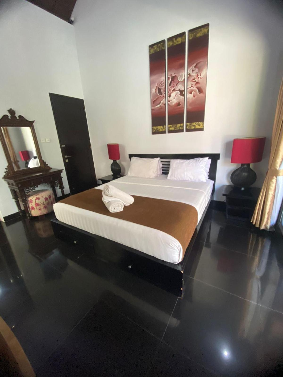 Deluxe Room - Photo 1