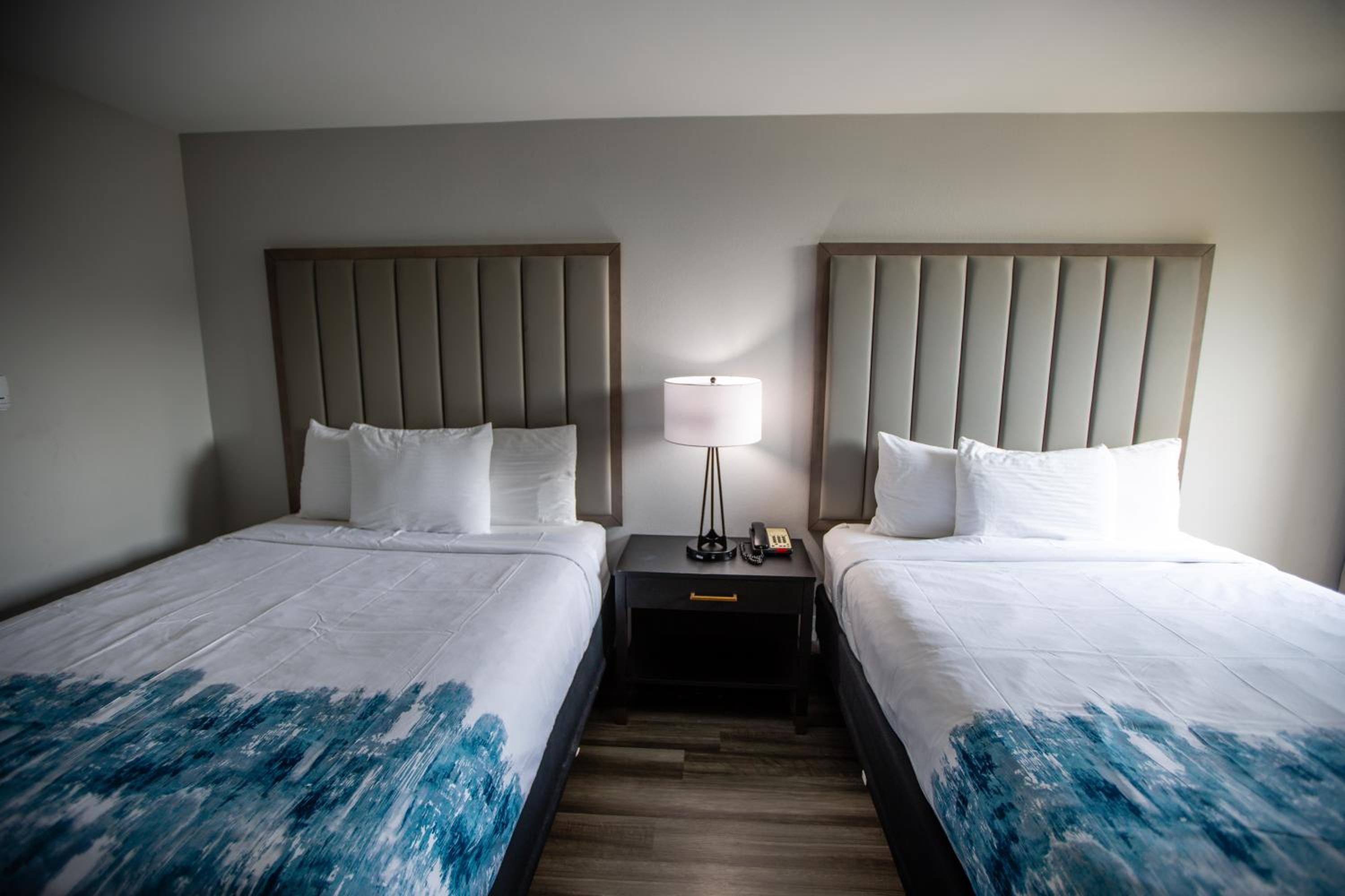 Deluxe Queen Room with Two Queen Beds - Photo 1