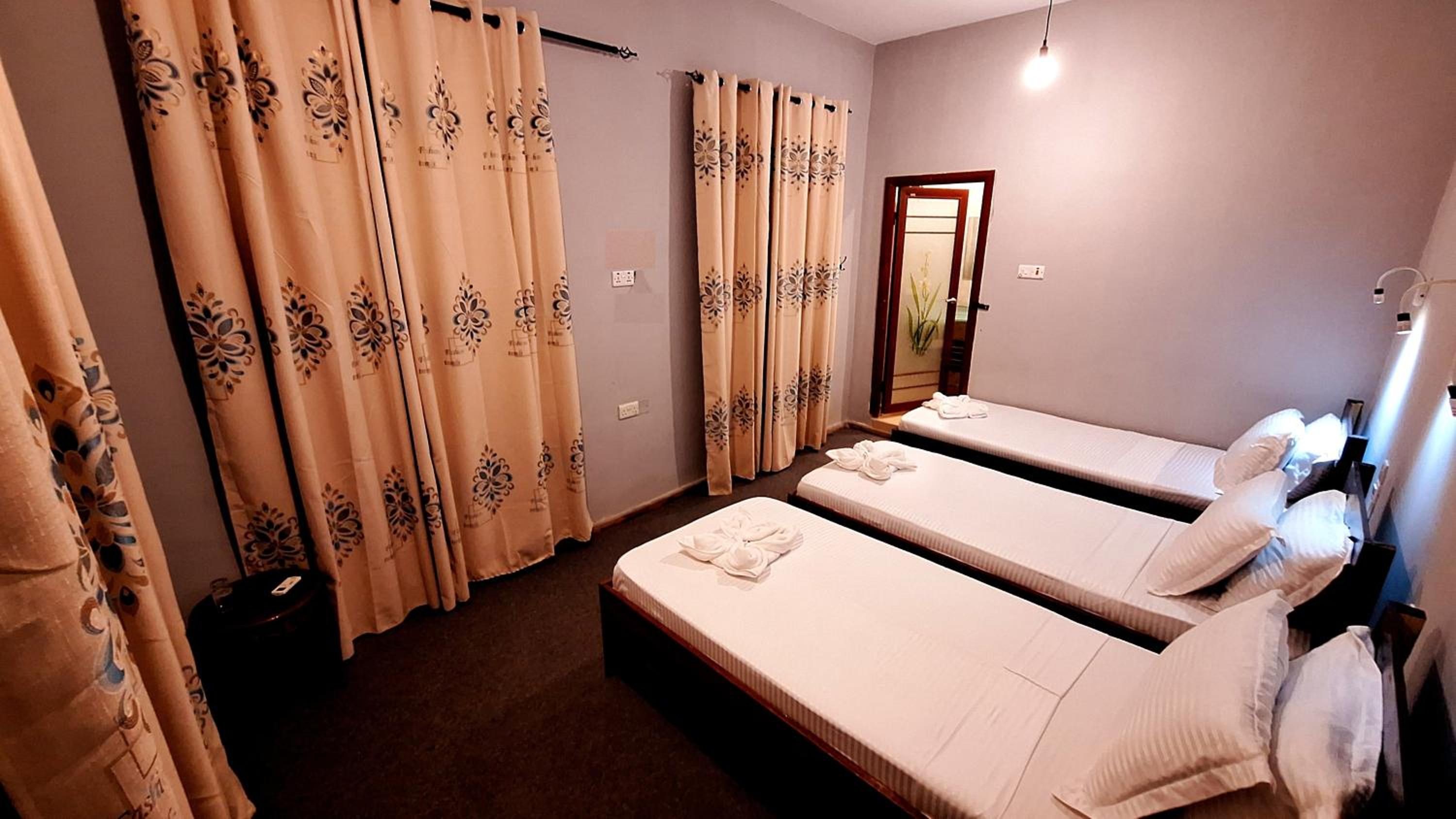 Triple Room - Photo 1