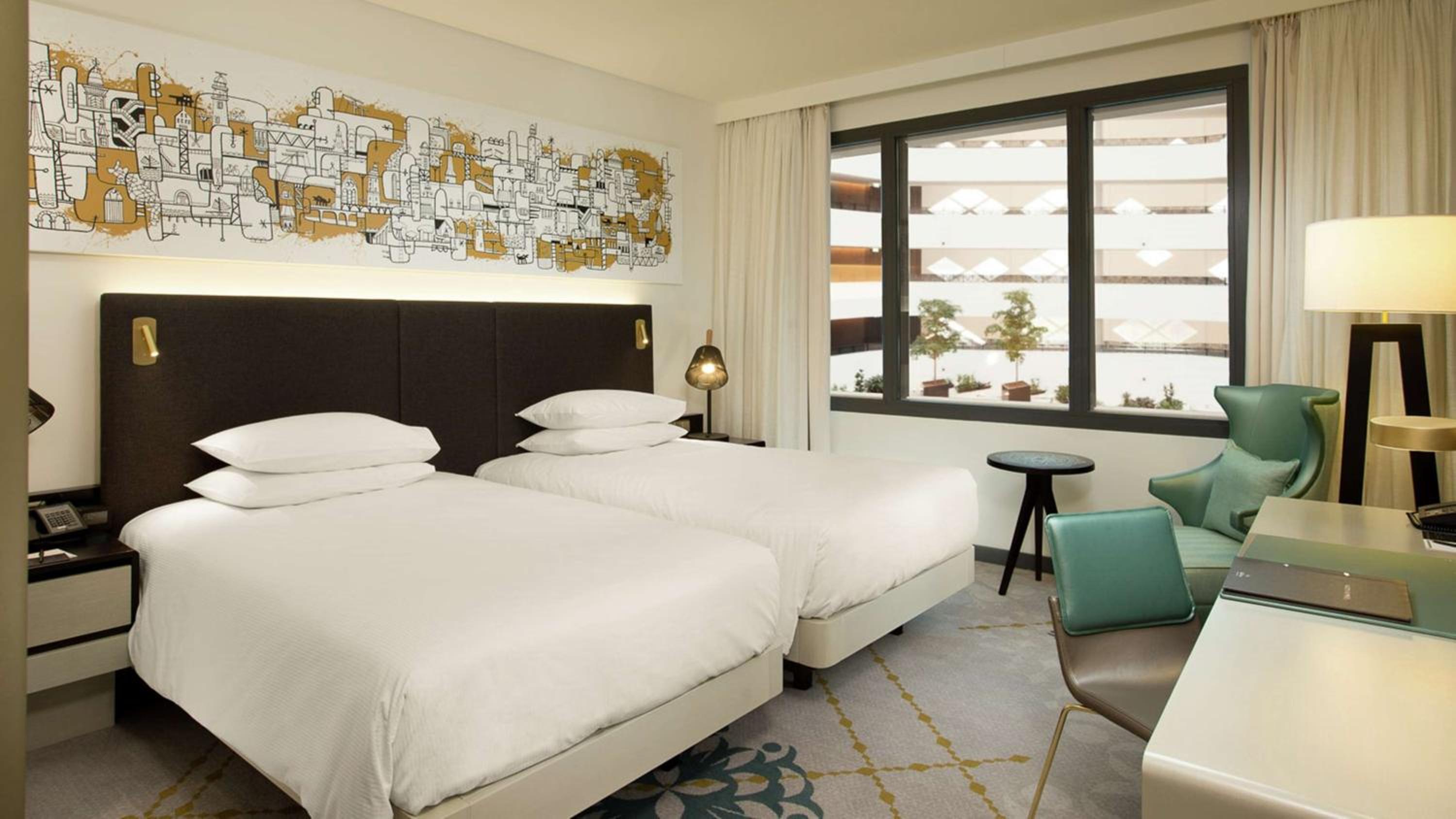 Twin Guest Room with Atrium View - Photo 2