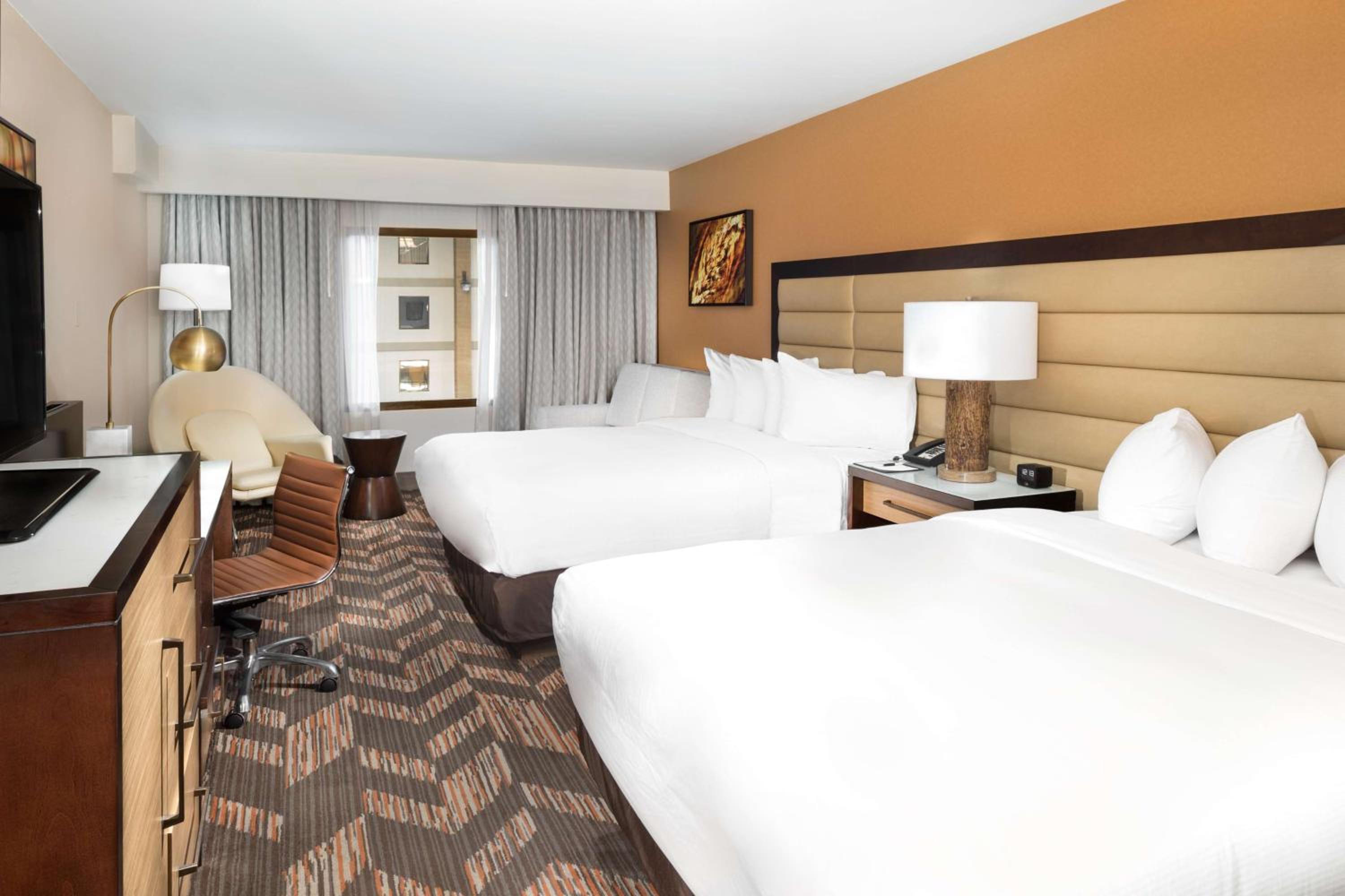 Deluxe Queen Room with Two Queen Beds - Photo 1