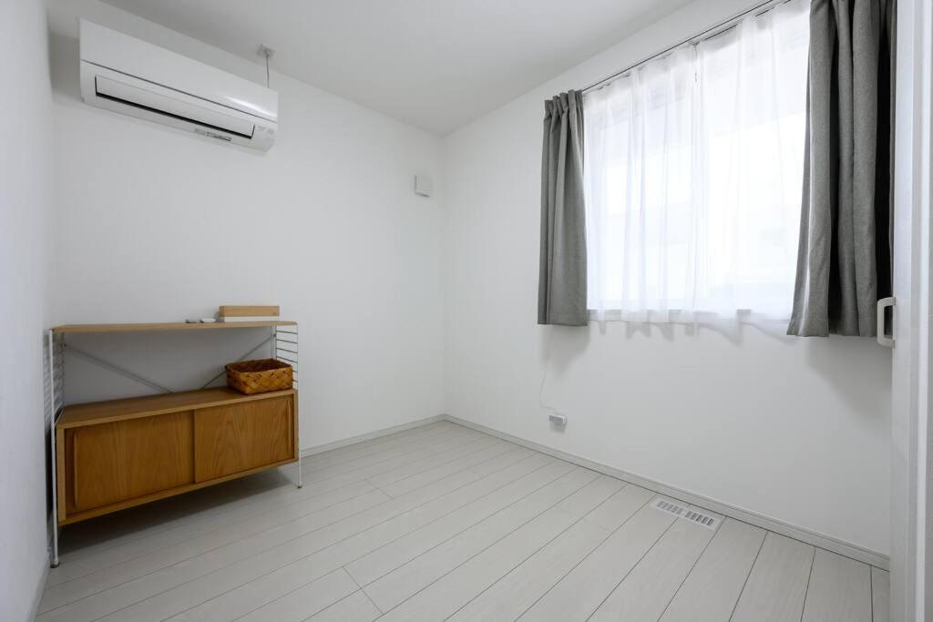 Three-Bedroom Apartment photo 2