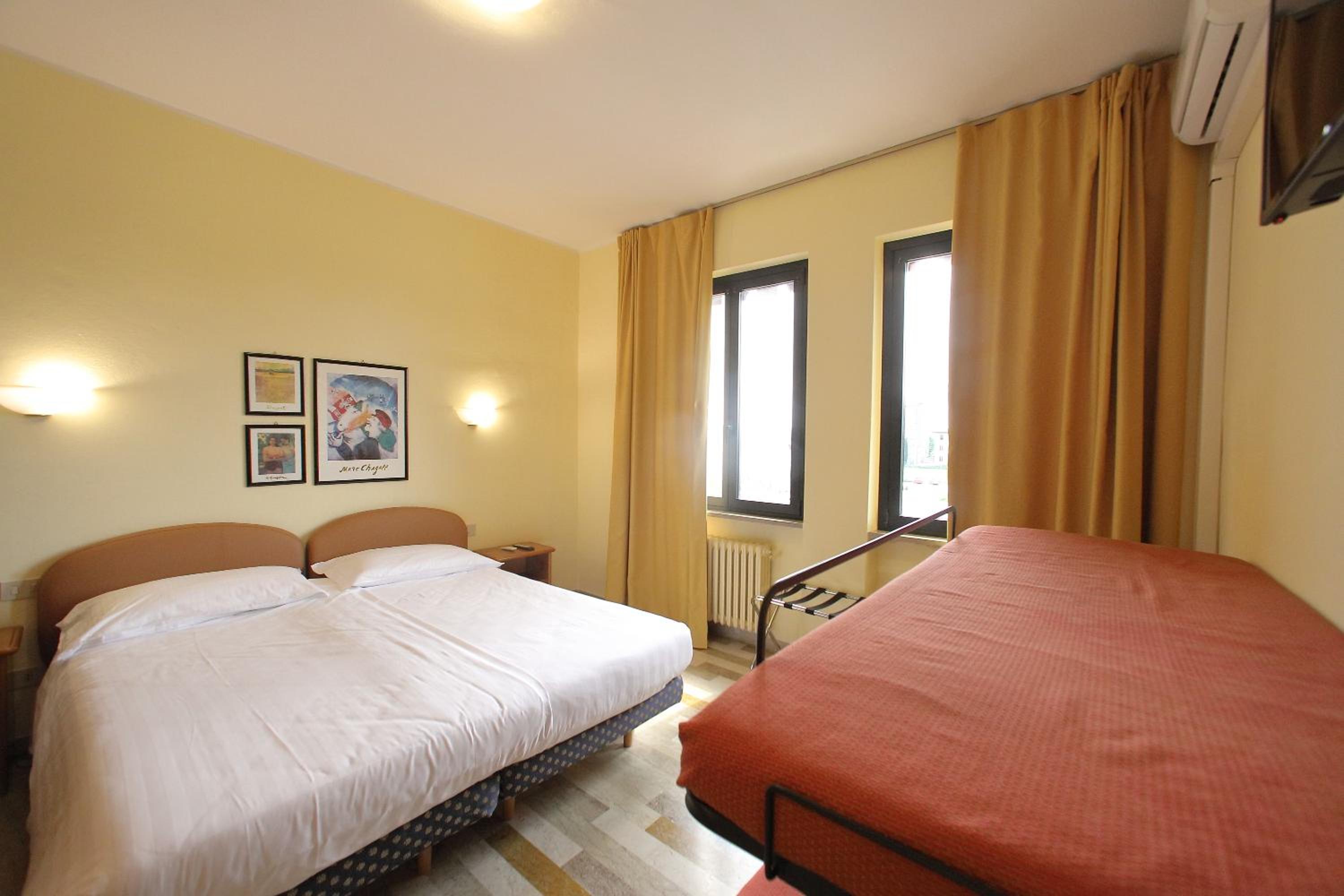 Habitación Deluxe (1 adulto + 2 niños)