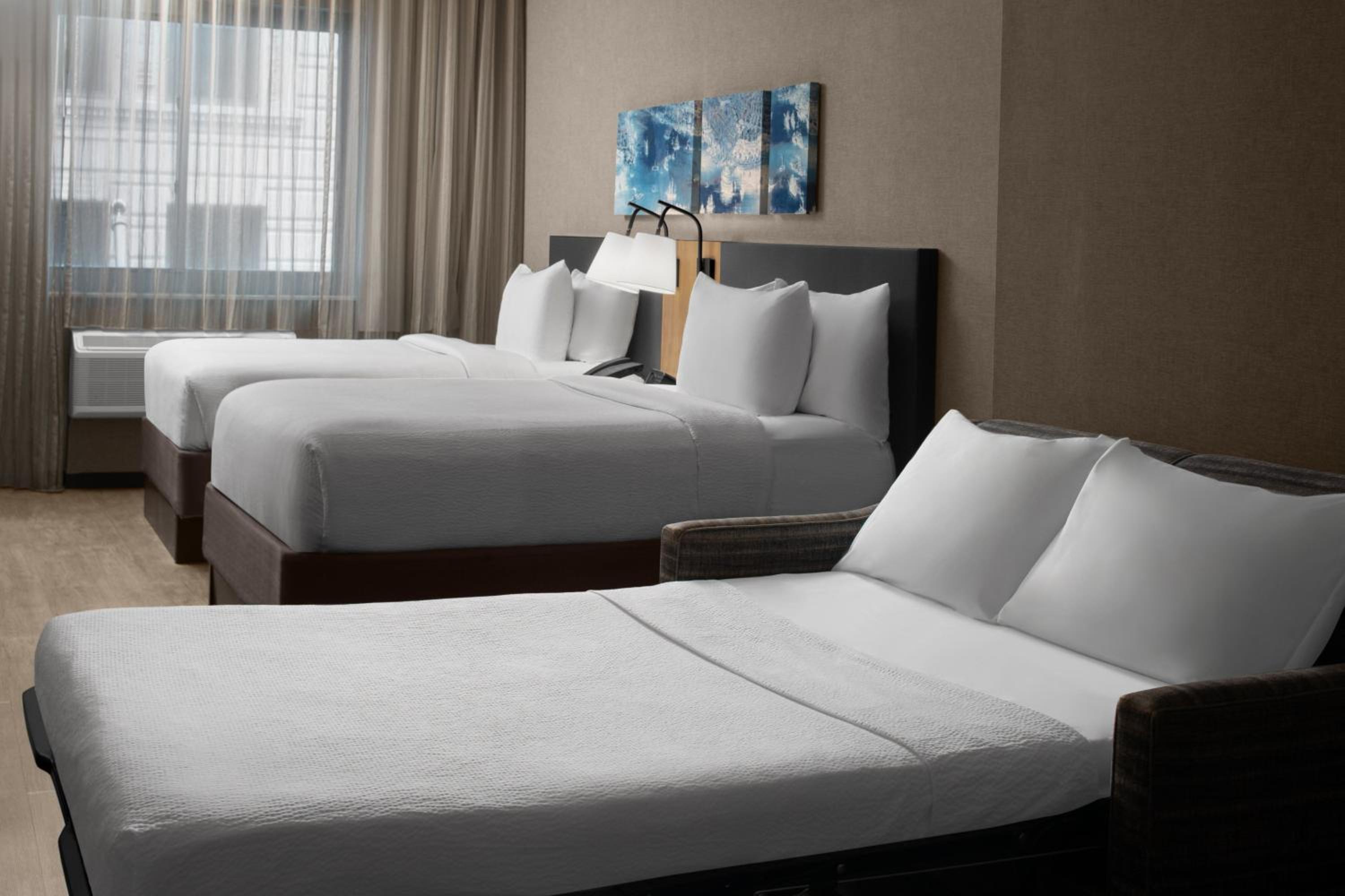 Large Double Room with Two Double Beds and Sofa Bed thumbnail 6