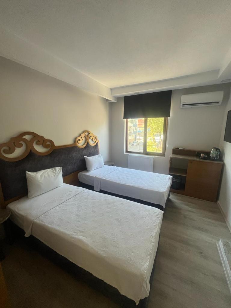 Standard Twin Room - Photo 7