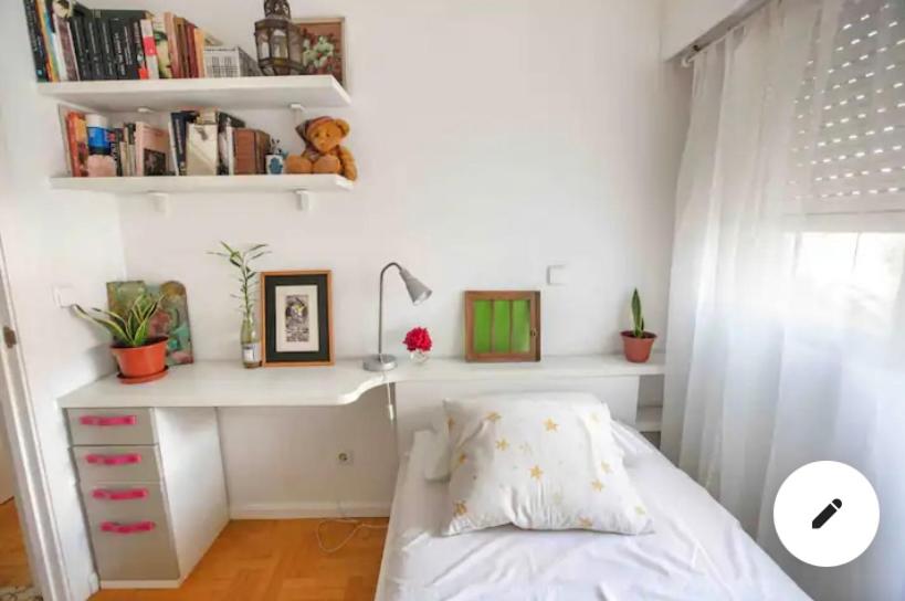 Habitación individual con baño compartido