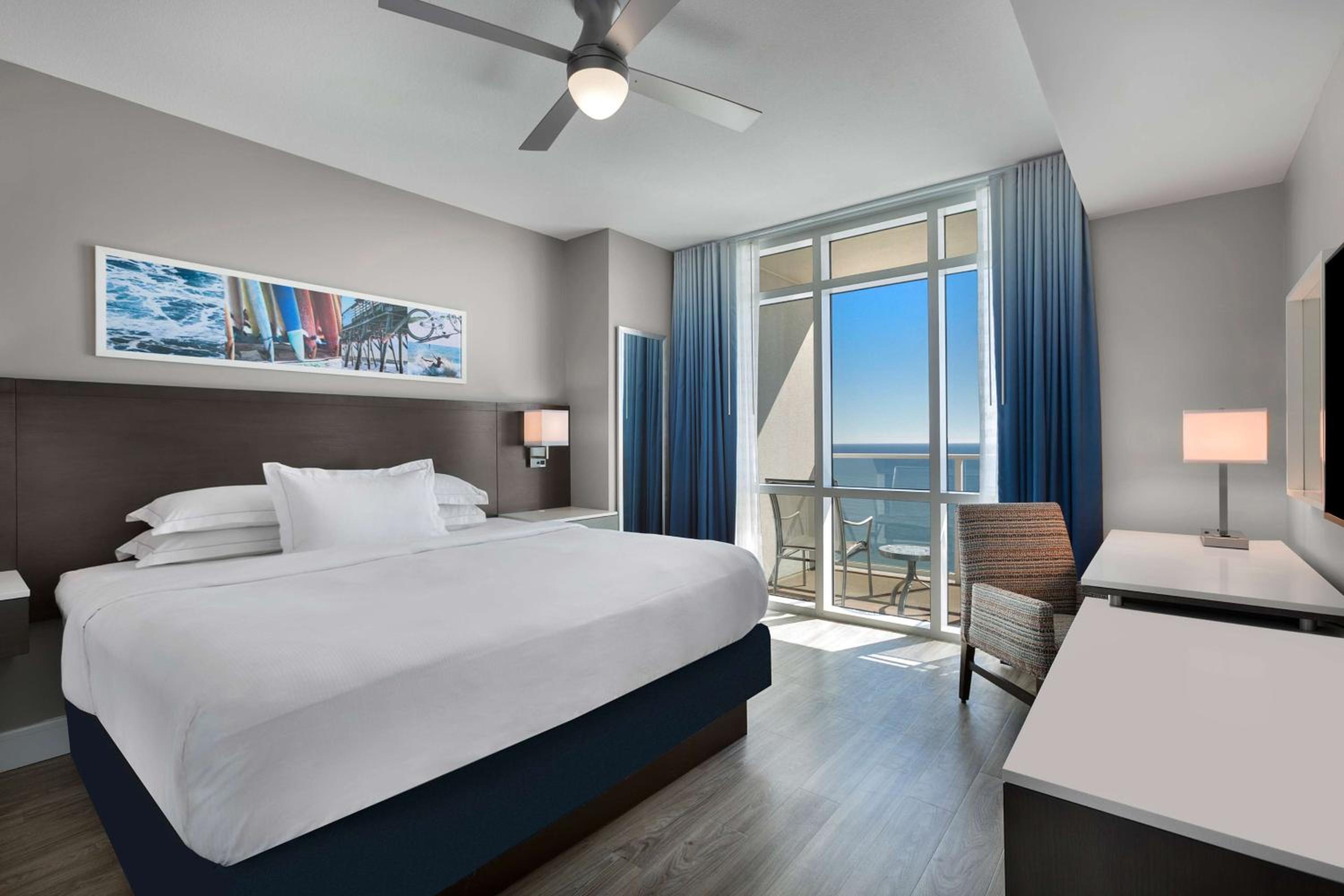 Three-Bedroom Oceanfront Suite with One King Bed and Three Queen Beds - Communication Assistance photo 1