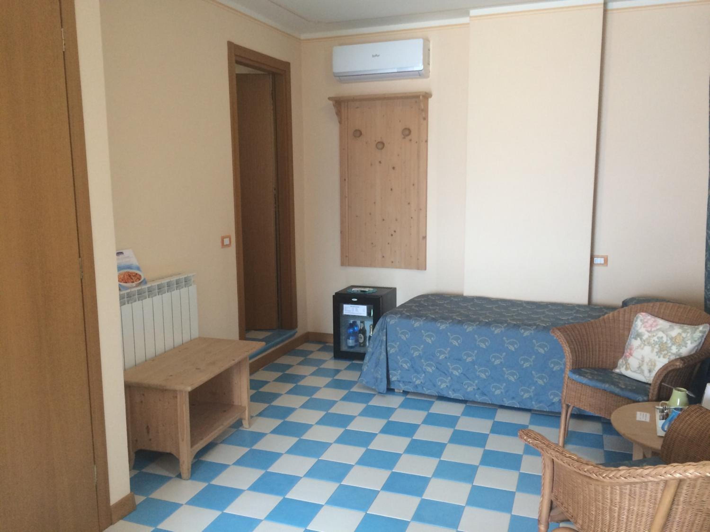 Quadruple Room with Balcony photo 2