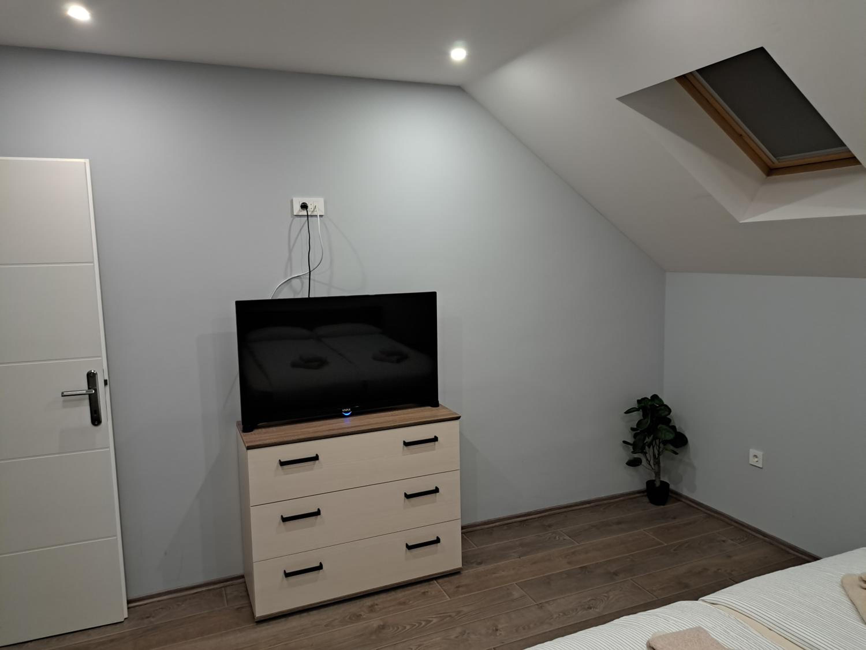 Three-Bedroom Apartment - Photo 16