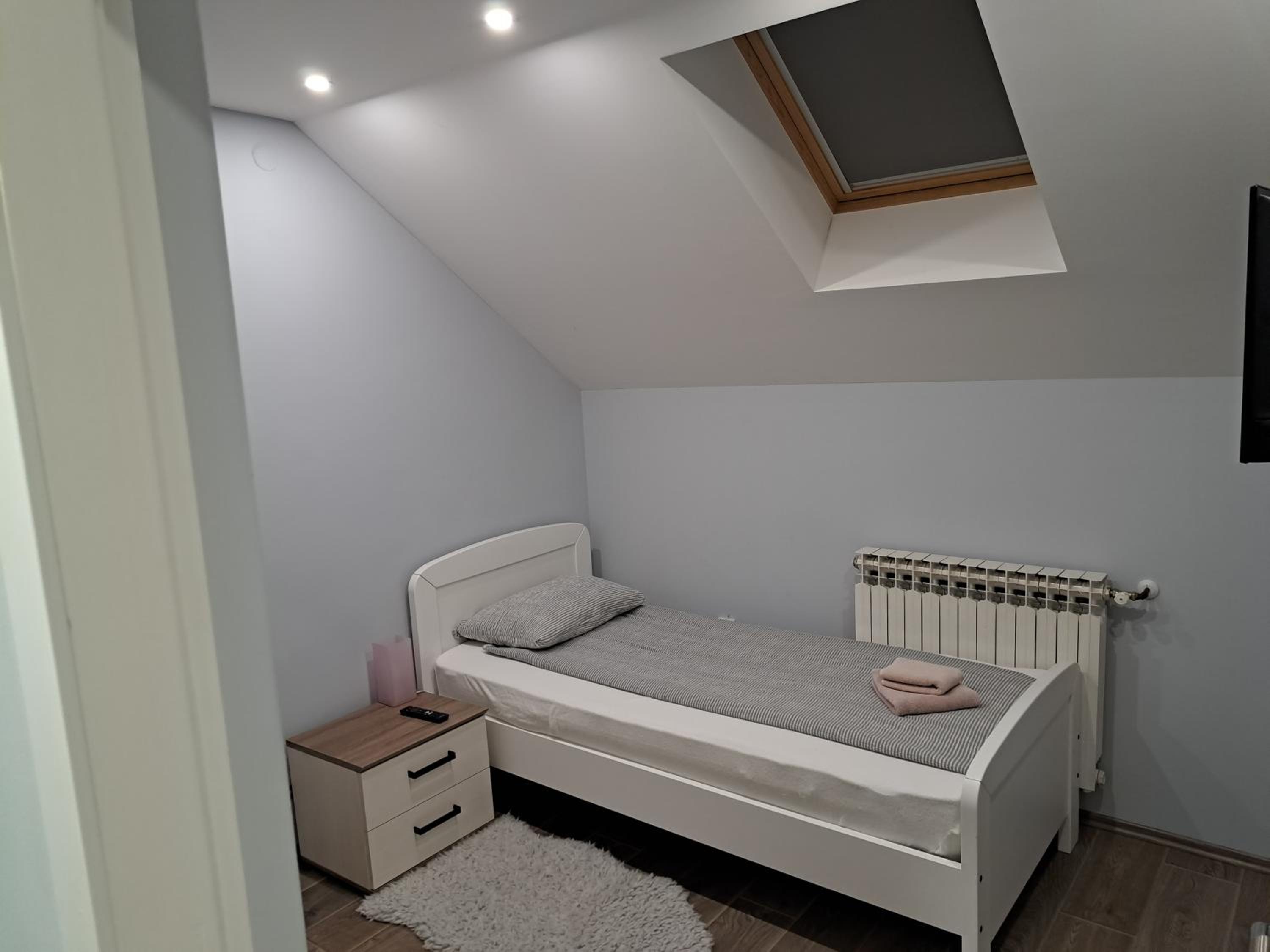 Three-Bedroom Apartment - Photo 18
