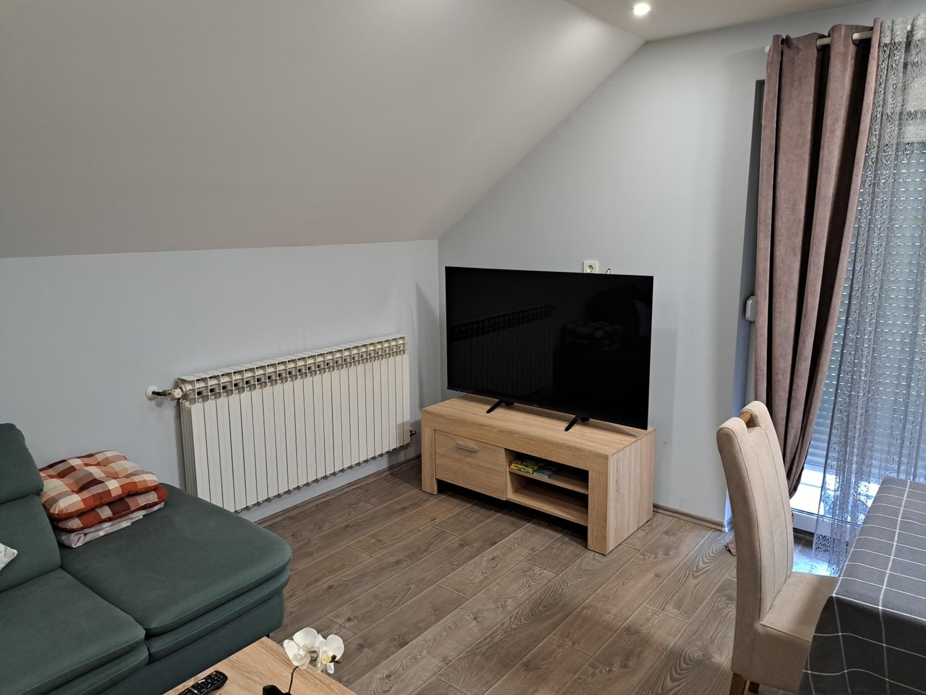 Three-Bedroom Apartment - Photo 56