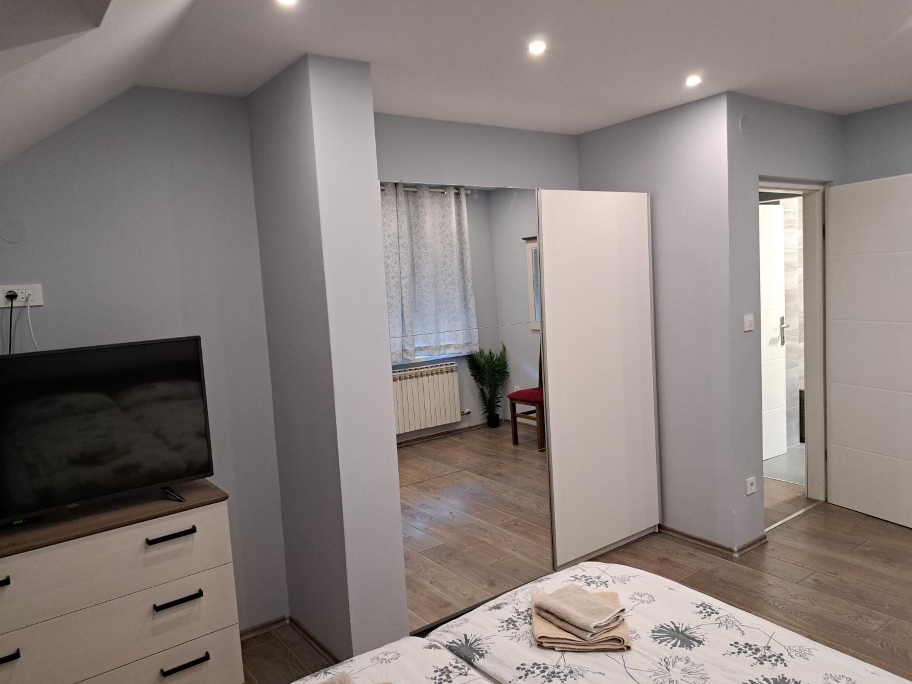 Three-Bedroom Apartment - Photo 11